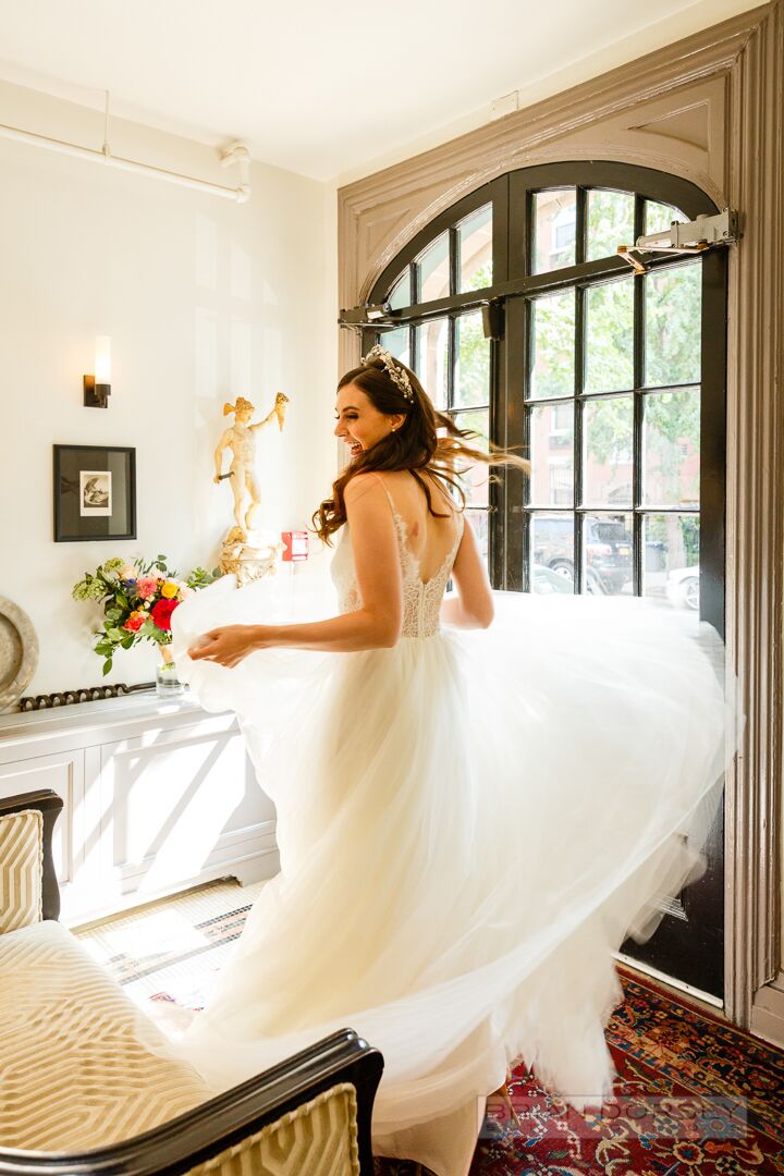 Twirling Bride In Wedding Dress And Crown