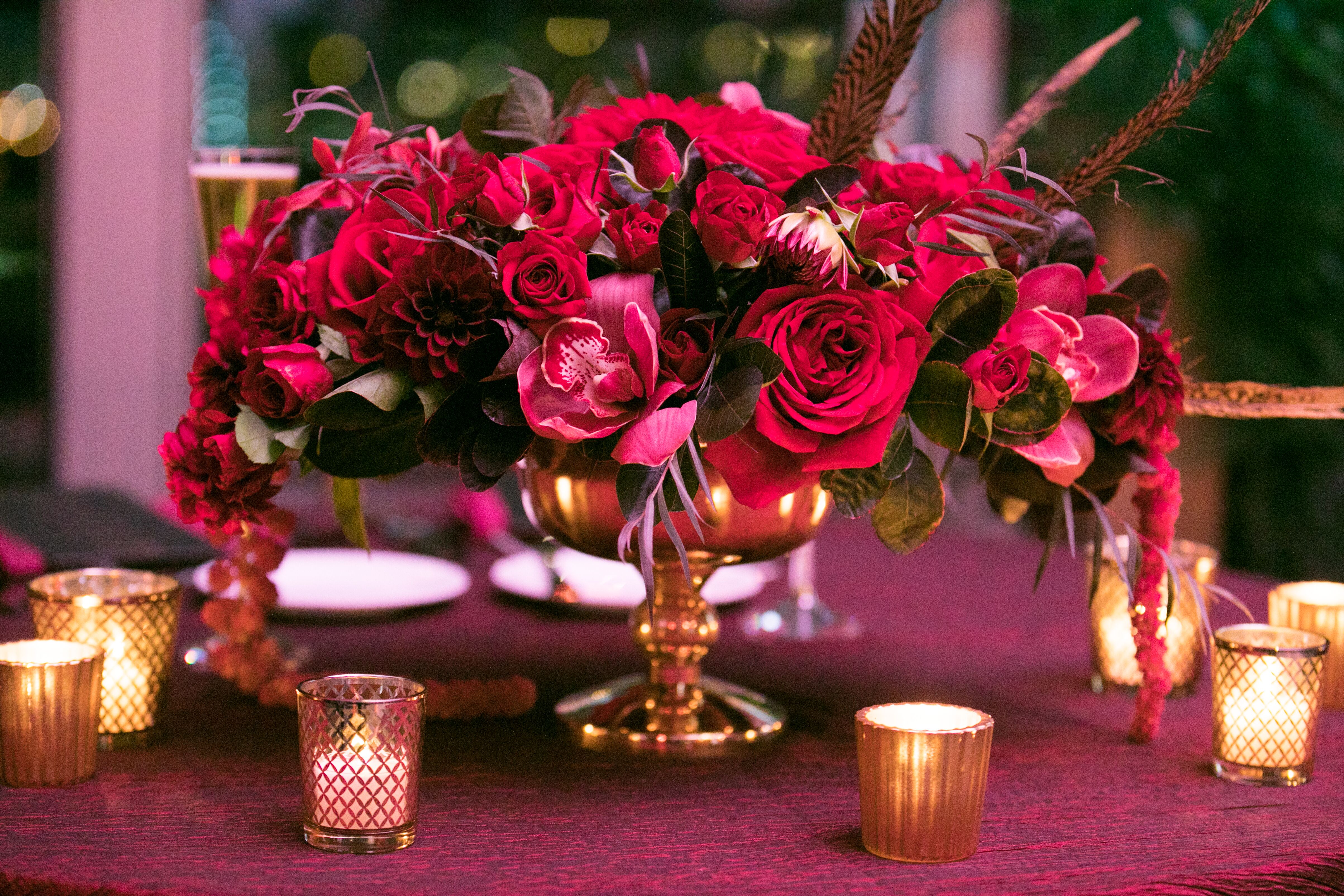 Low Burgundy Centerpiece with Feathers