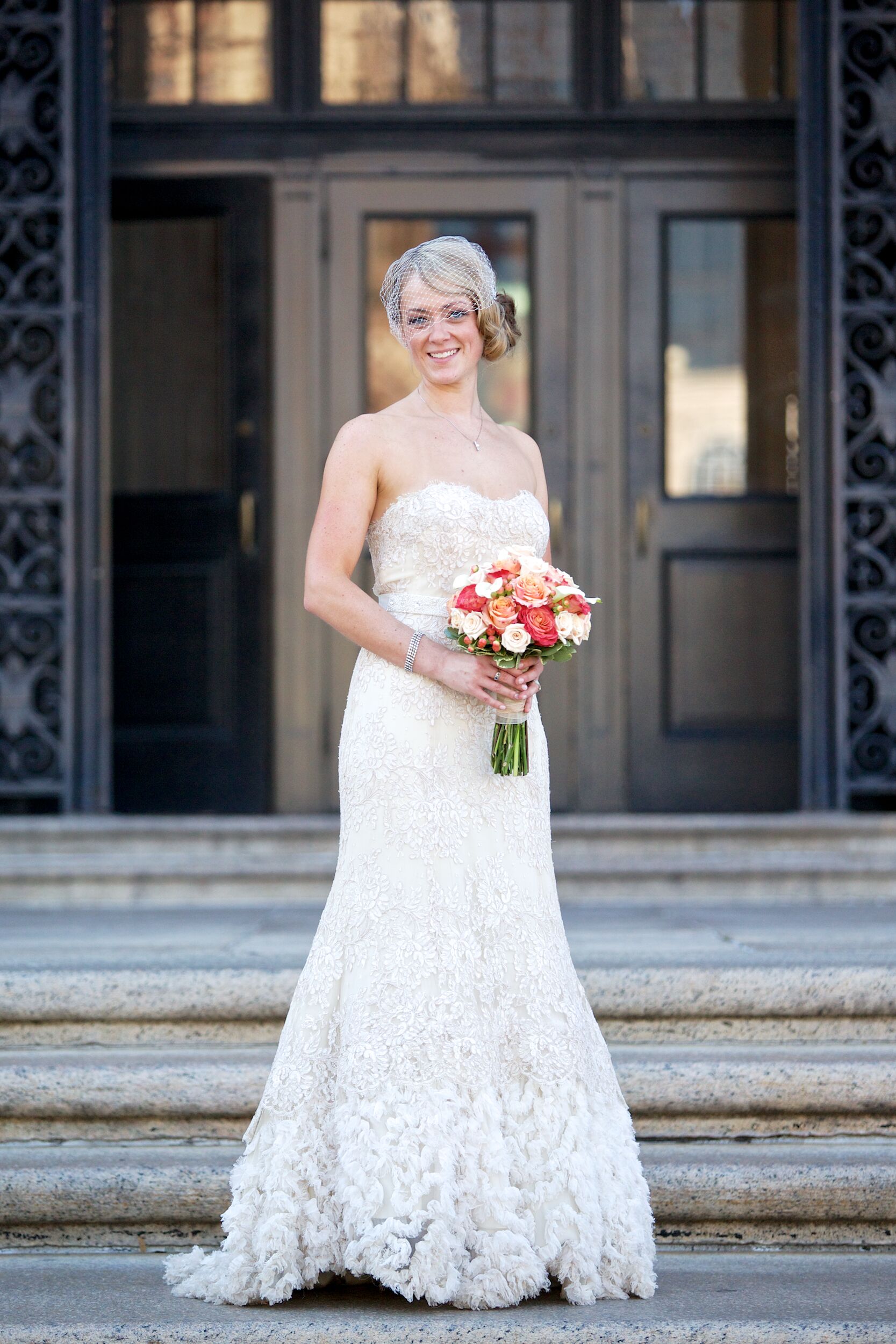 Bride in Vintage Strapless Lace Wedding Dress and Birdcage Veil