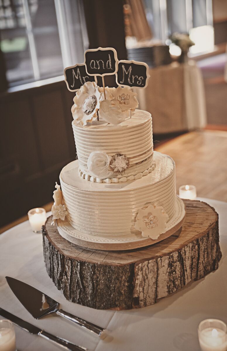 Two-Tier White Wedding Cake with Chalkboard Cake Topper on Wood Stump Base