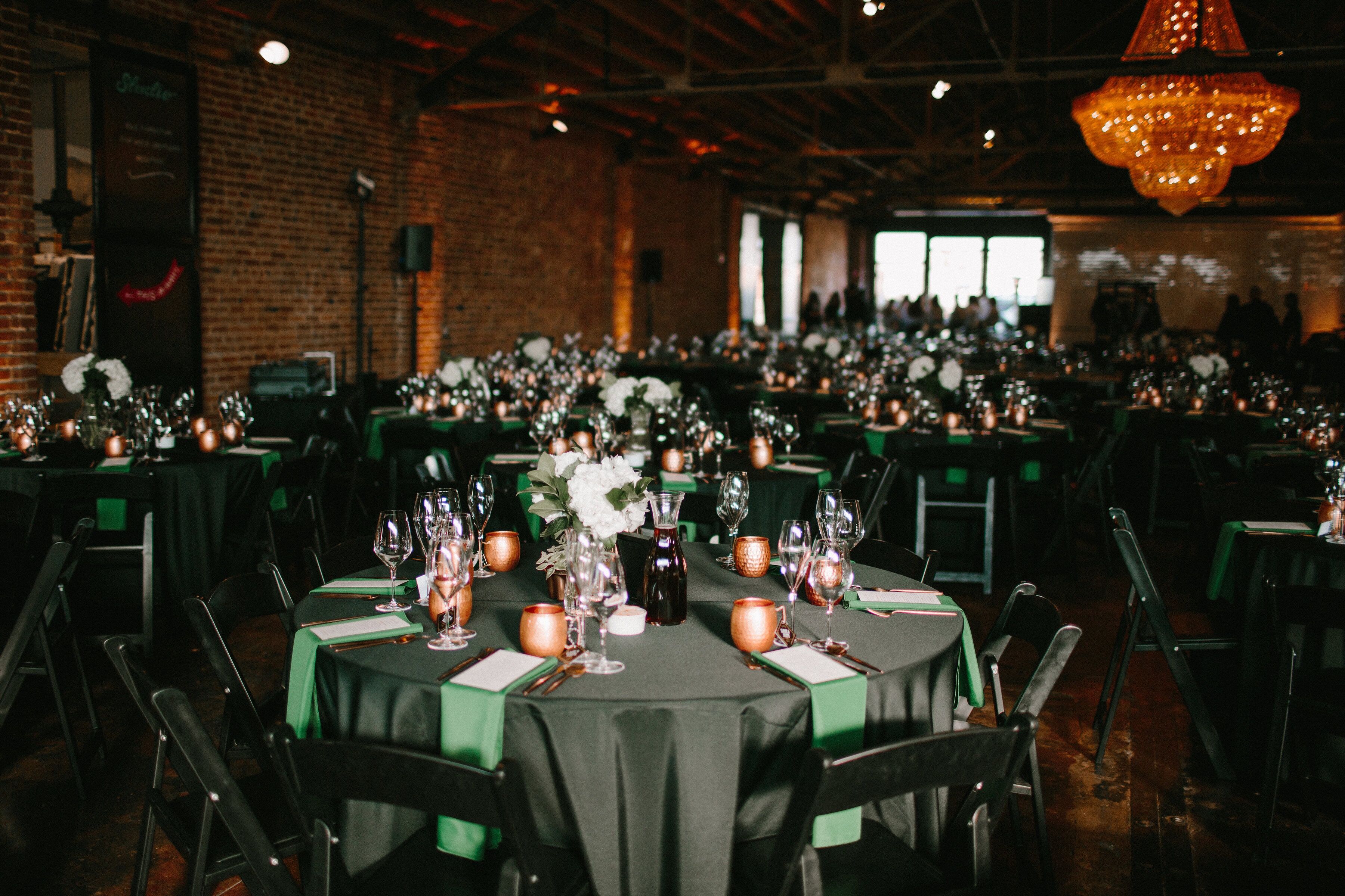 Round Reception Tables With Black Tablecloths