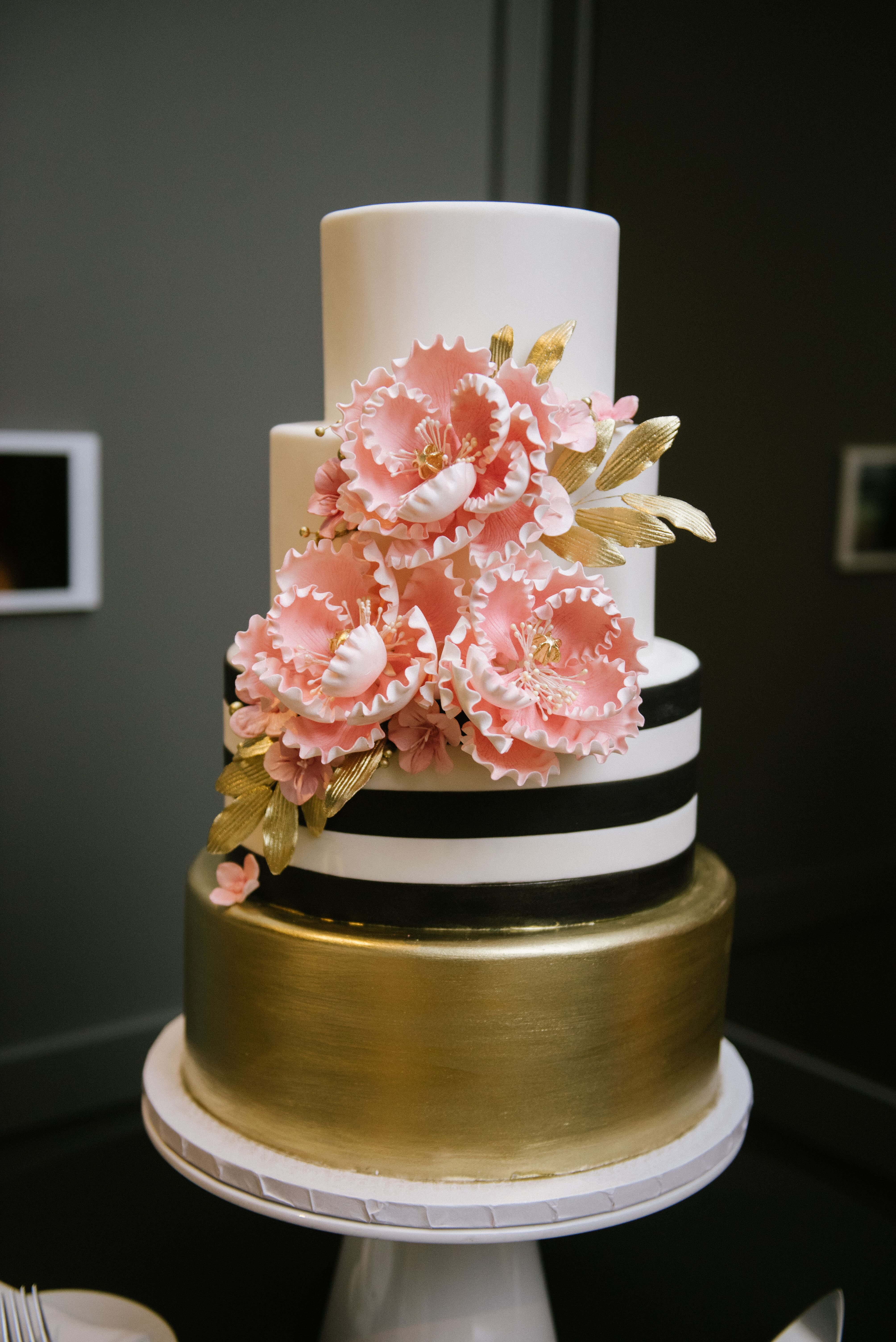 Modern Black White And Gold Wedding Cake With Pink Sugar Flowers