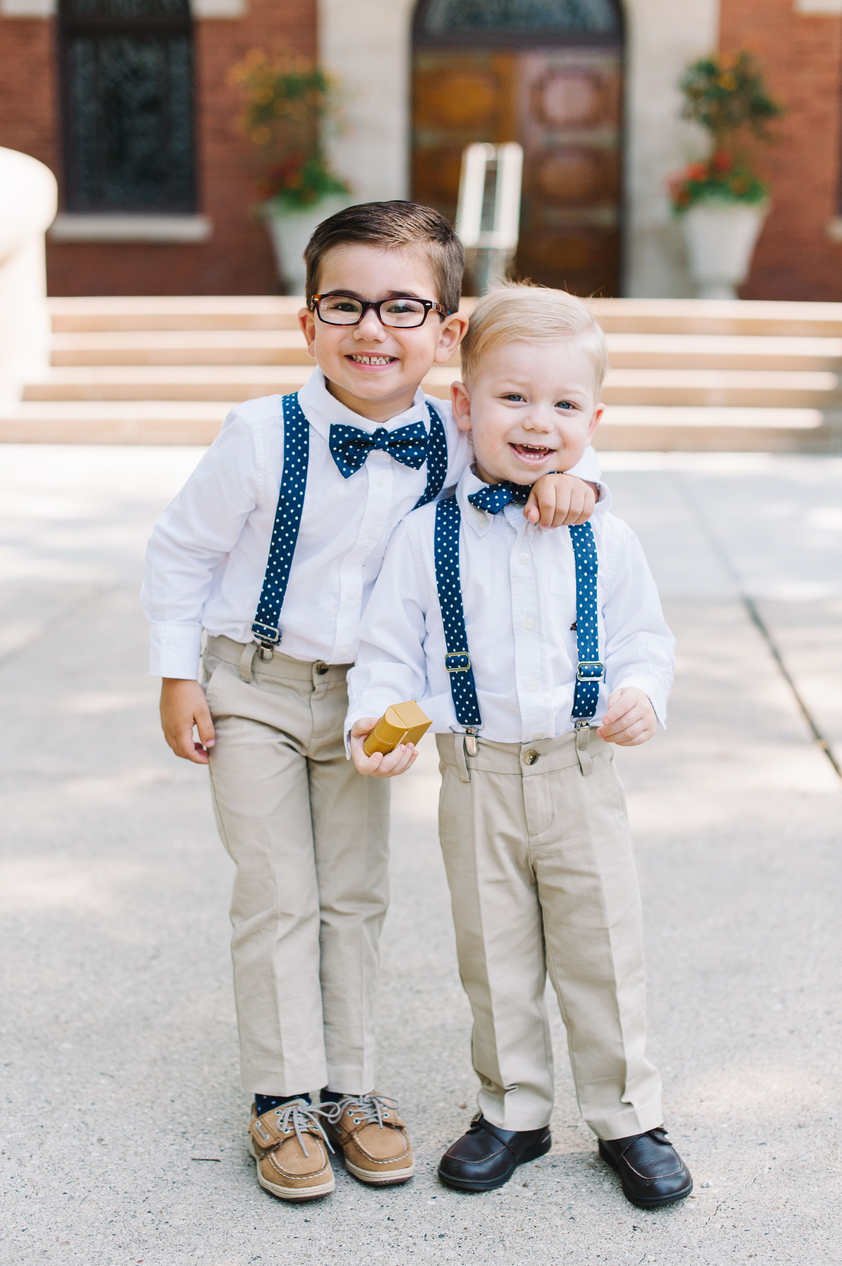 ring-bearers-with-blue-bow-ties-and-suspenders