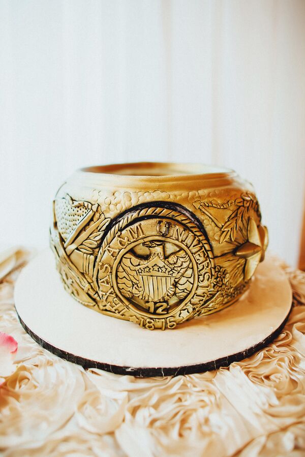 Ivory Buttercream Wedding Cake With Burgundy Flowers