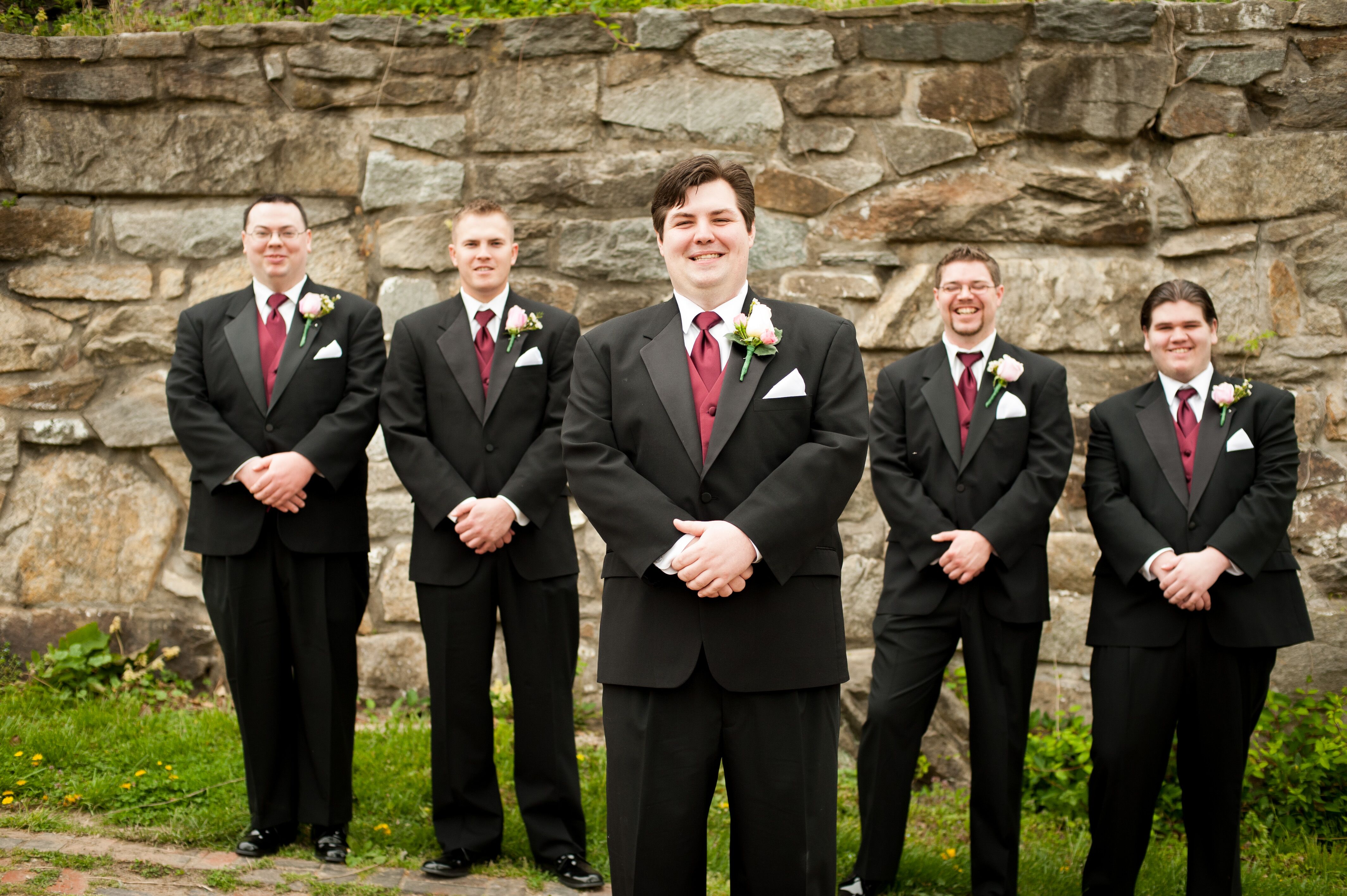 black suit and red tie