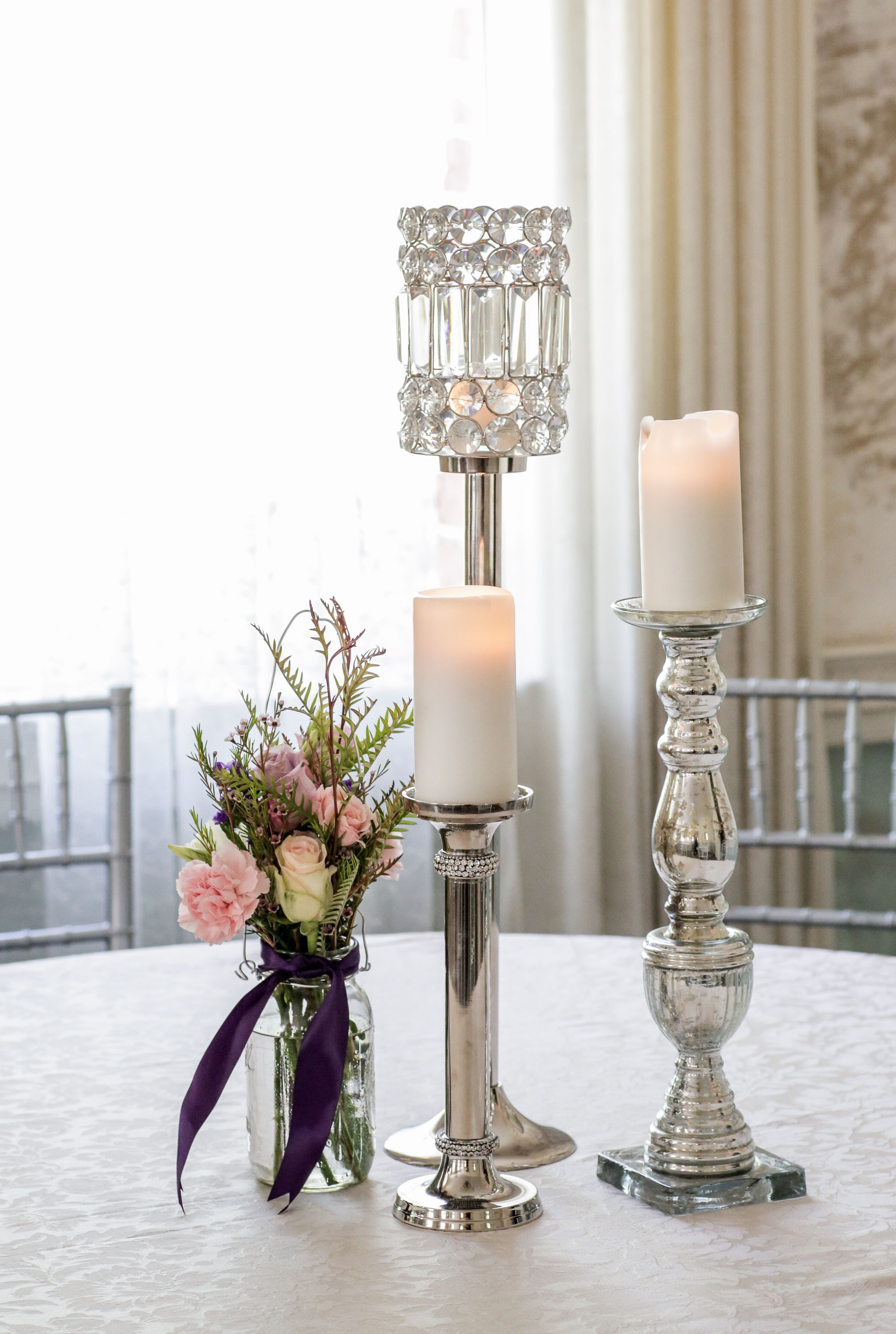 Silver Candleholders and White Candle Centerpieces