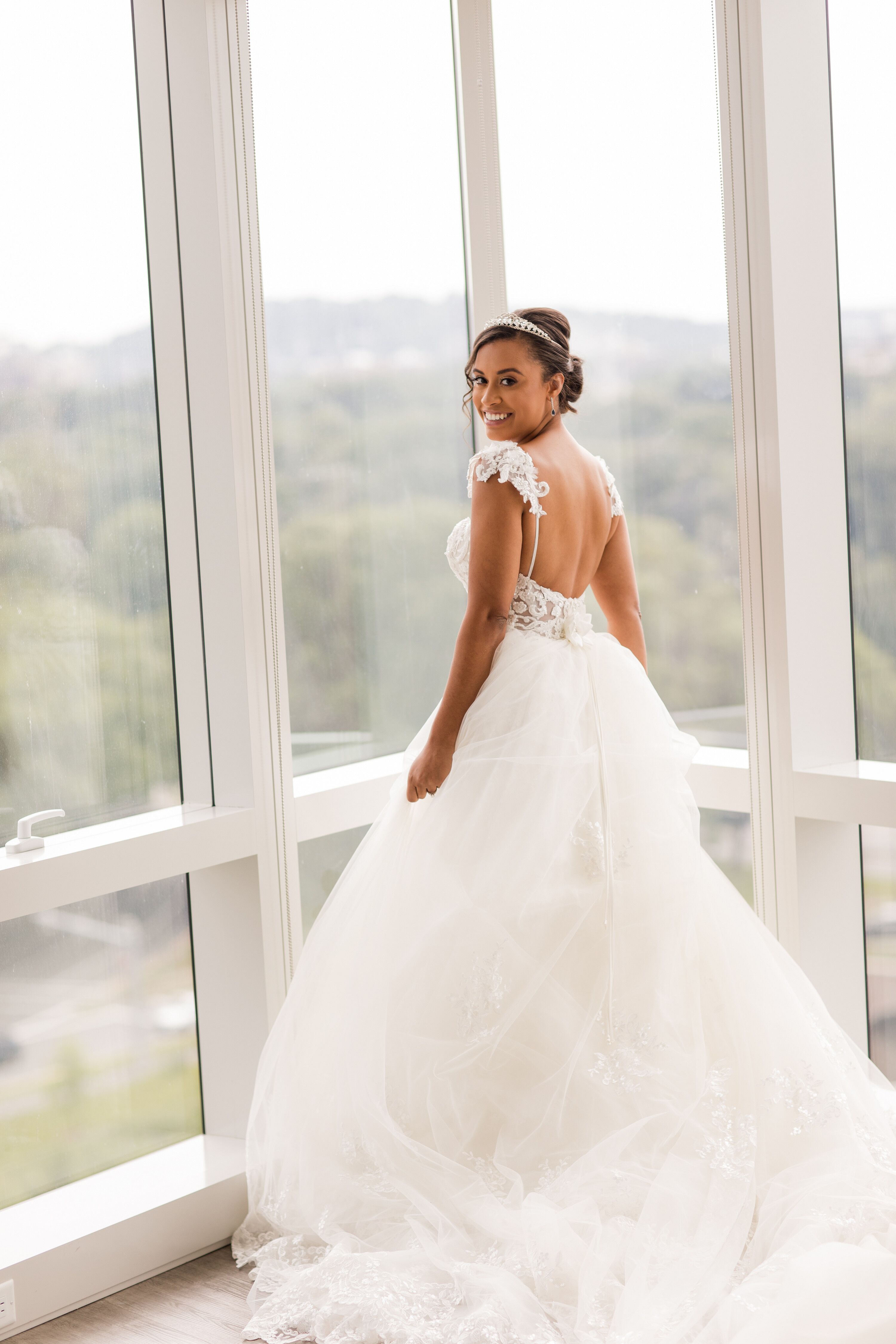 Bride Putting on Wedding Dress in Boston