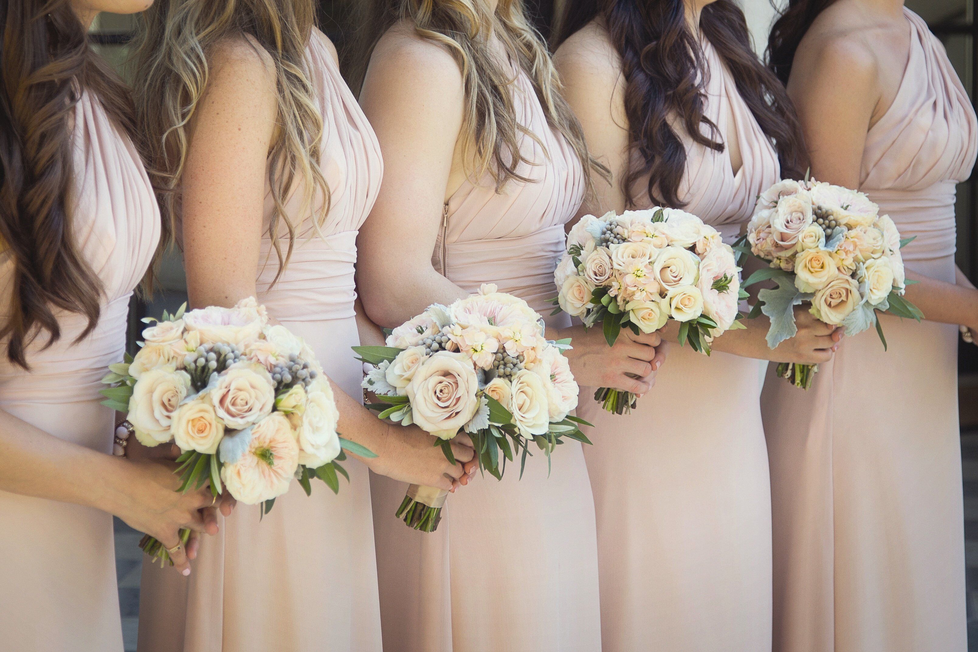 bridesmaids with bouquets