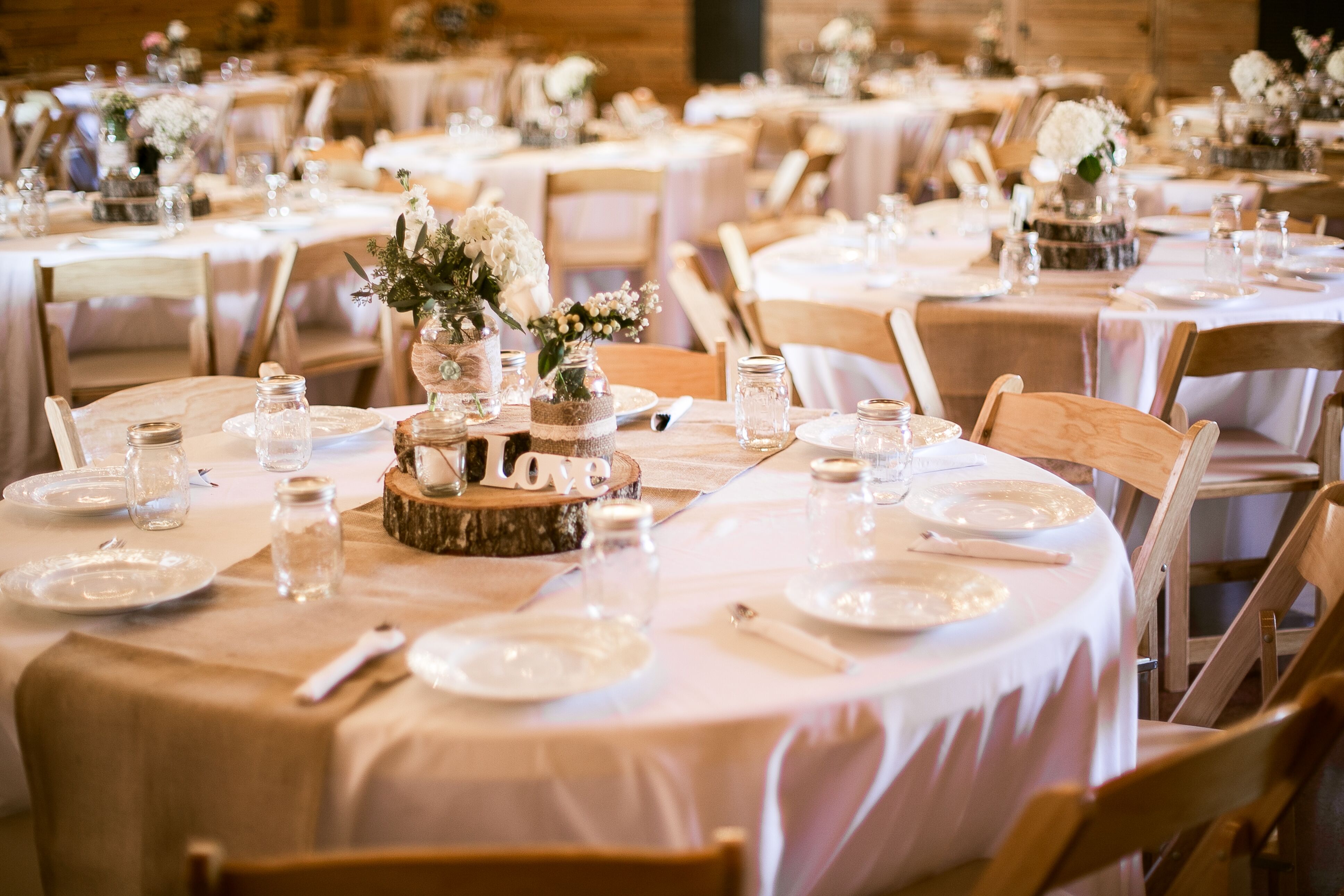 Simple Reception Table Decor with Wooden Chargers