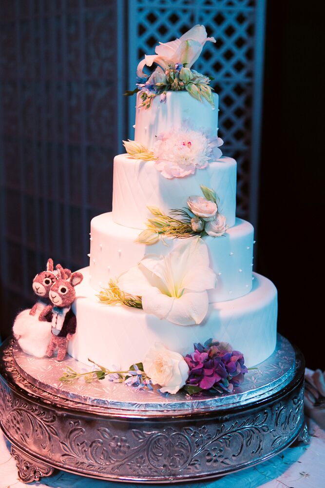 Four-Tier Round Wedding Cake With Fresh Flowers