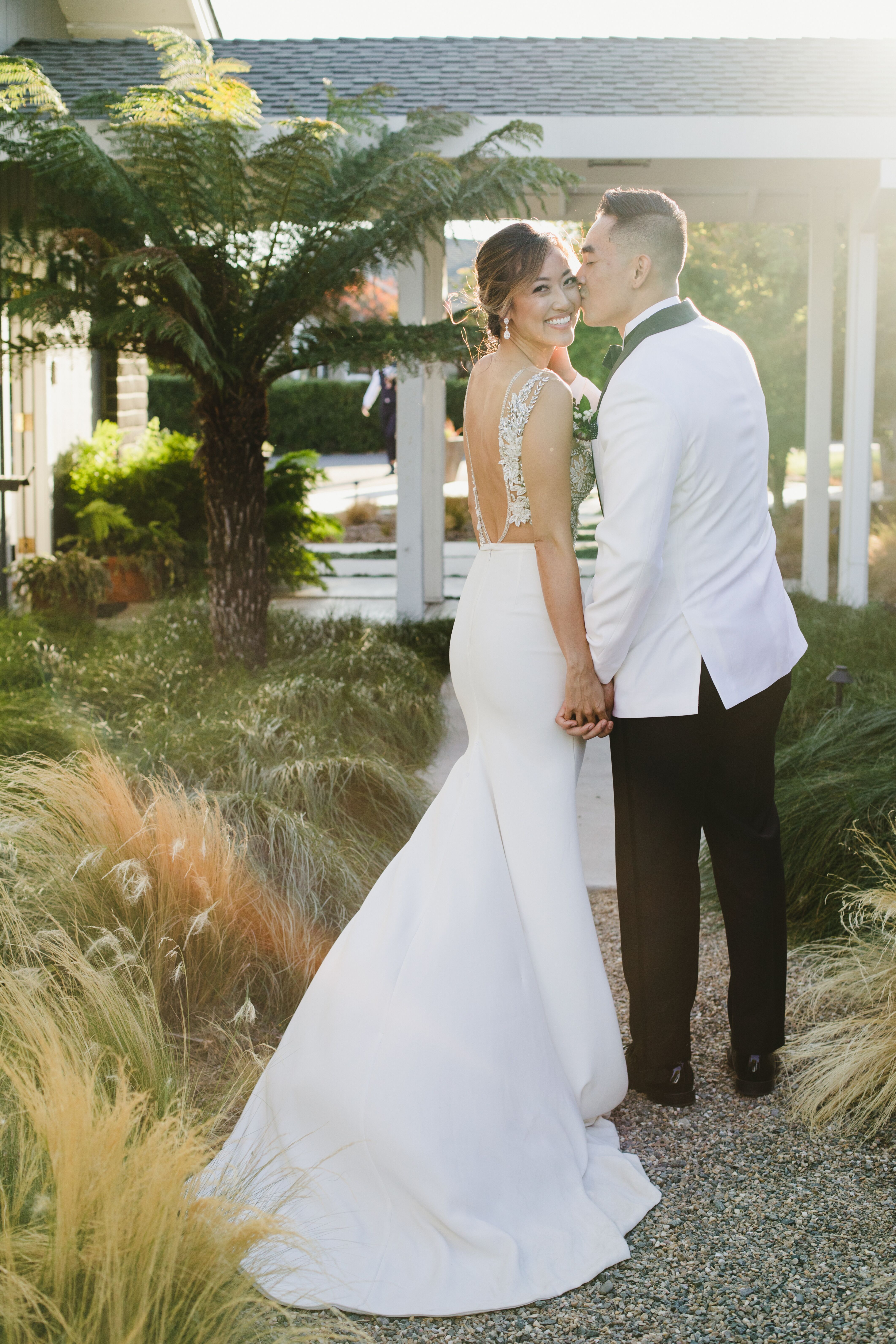 10 chic bridal suits inspiration from brides who styled them on white tuxedo wedding dress