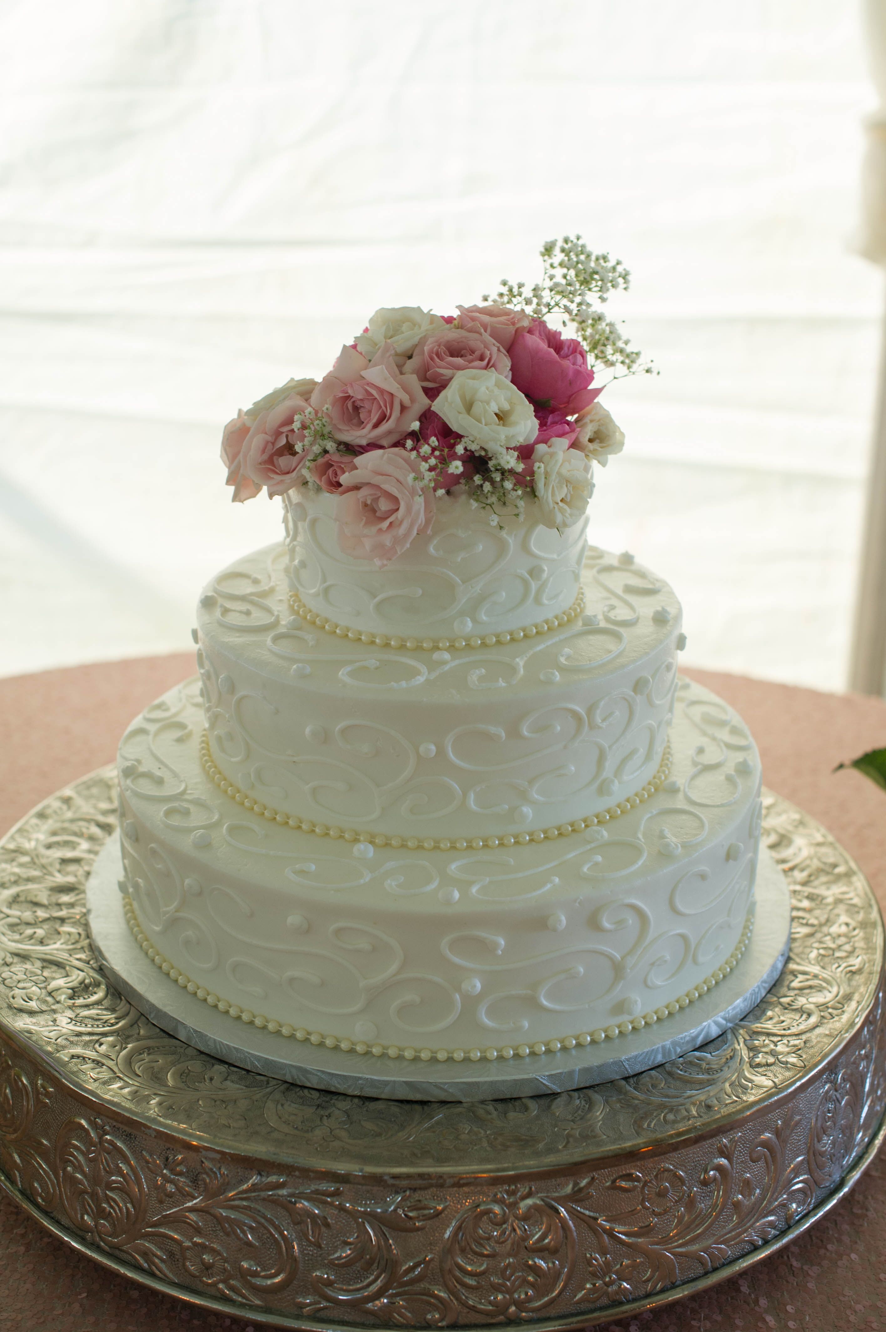 Traditional Three Tiered Wedding Cake With Pink Roses 