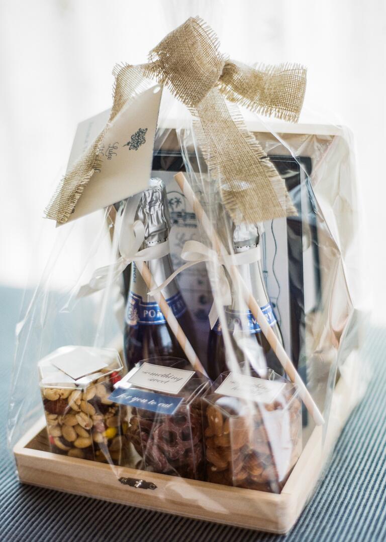 Wedding welcome bag with champagne and snacks