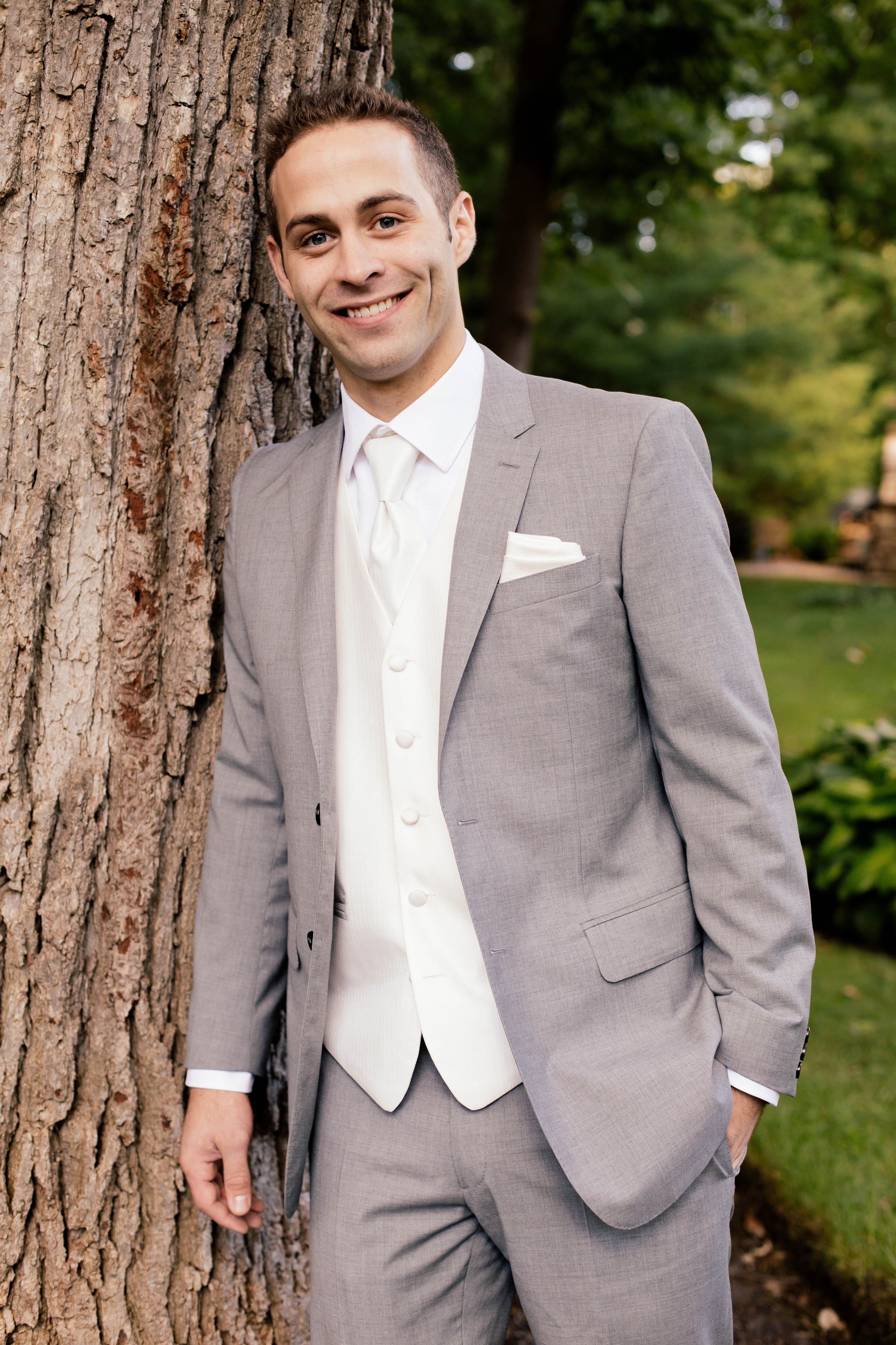 Groom in a Gray Suit with a White Tie