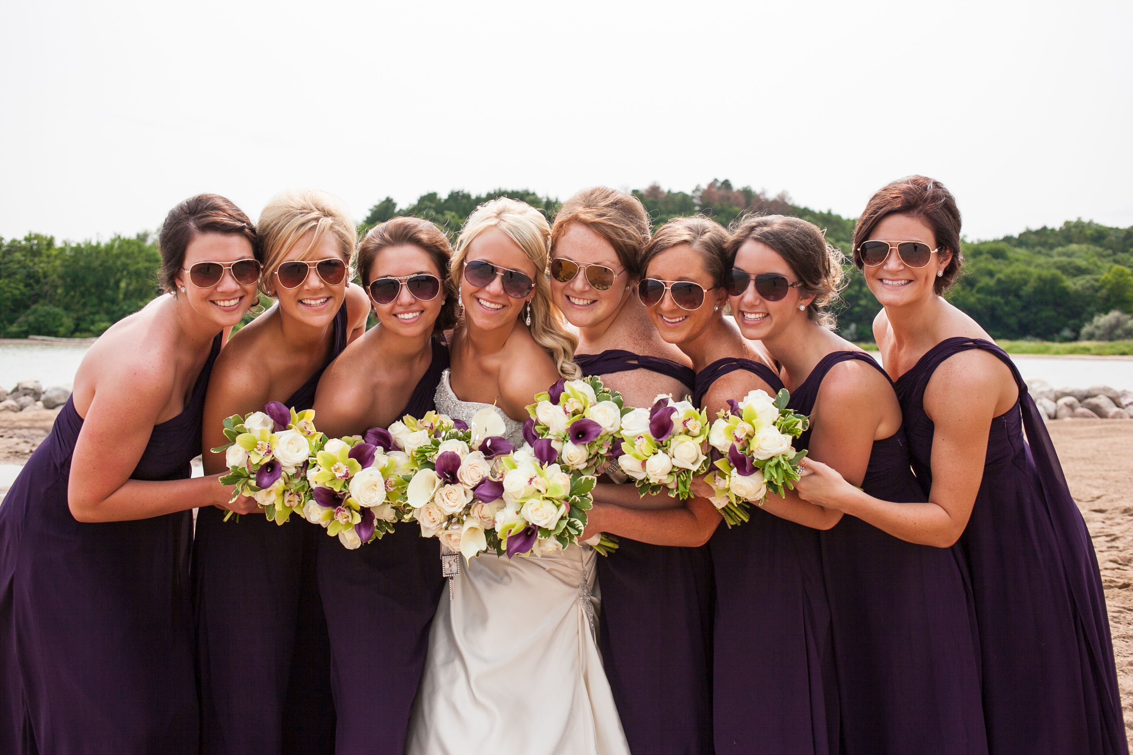 Bridesmaids in Sunglasses and Purple Asymmetrical Dresses