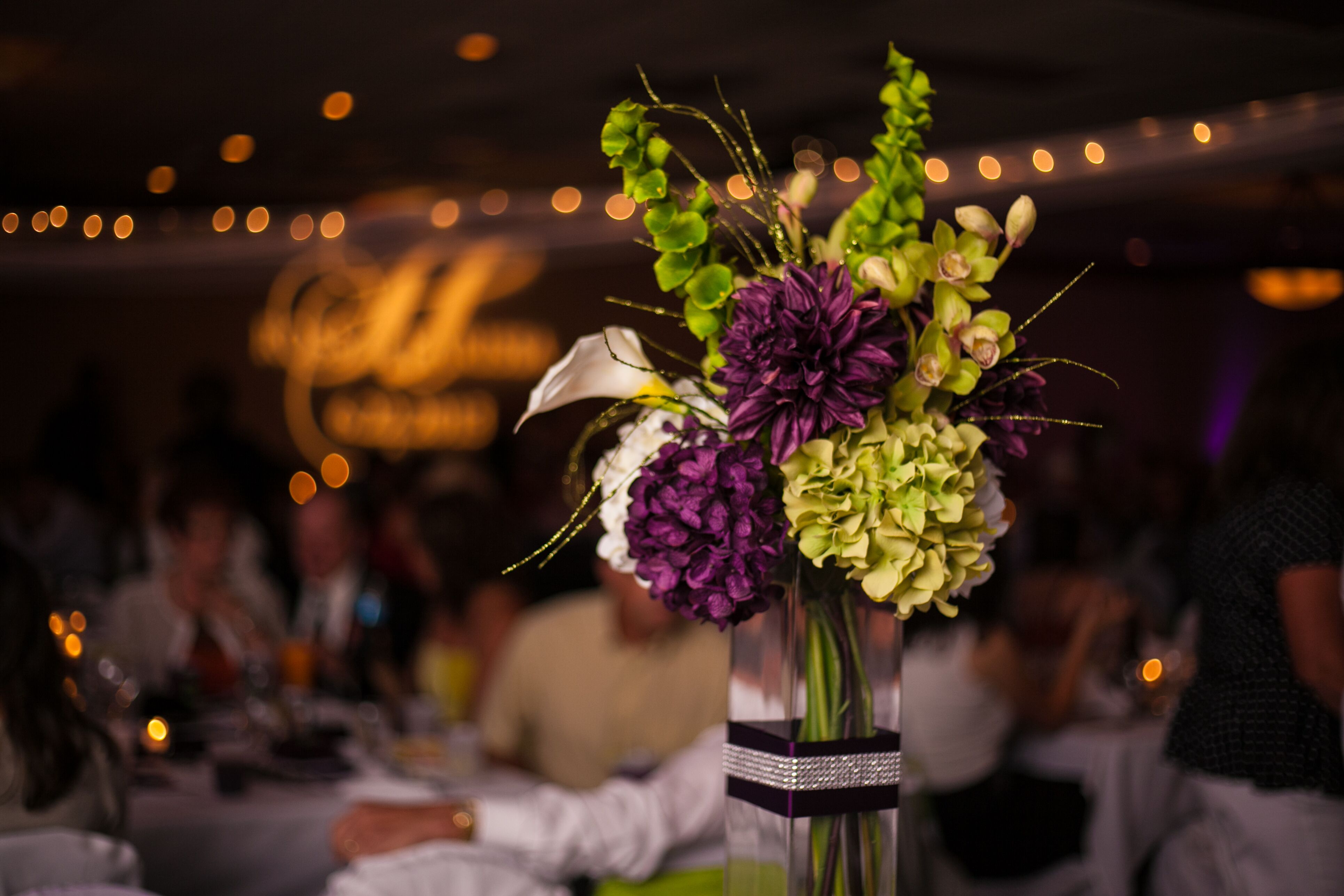 Purple and Green Centerpiece with Bells of Ireland