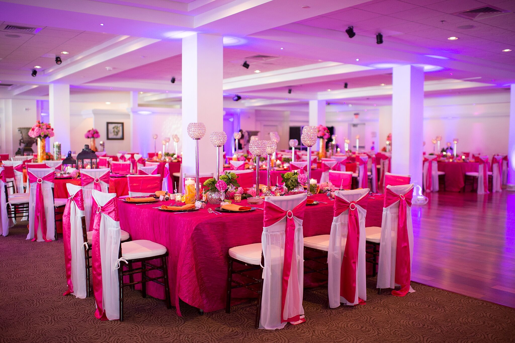 Fuchsia Reception With Purple Uplighting