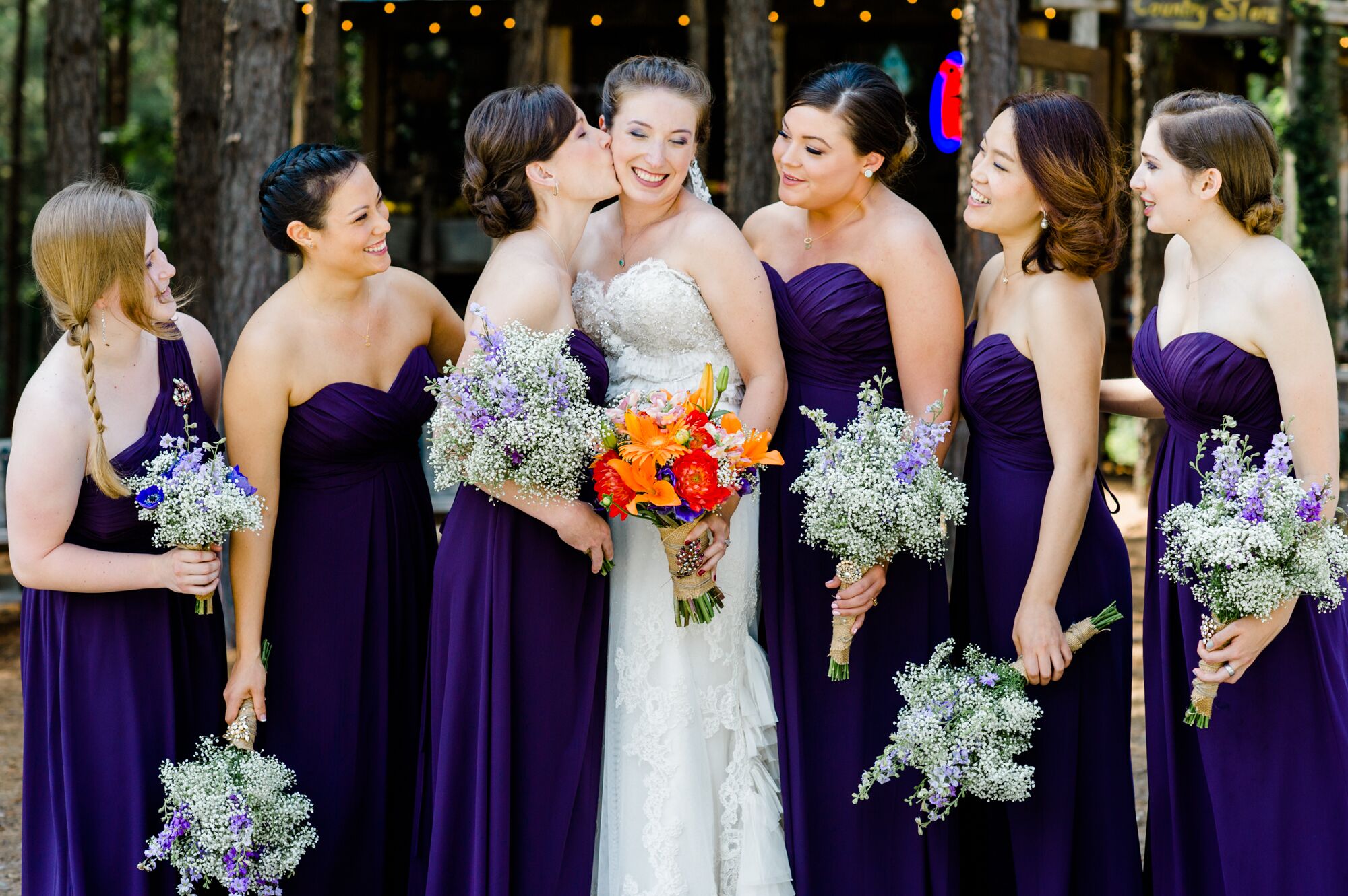 Purple Bridesmaid Dresses With Baby s Breath Bouquets