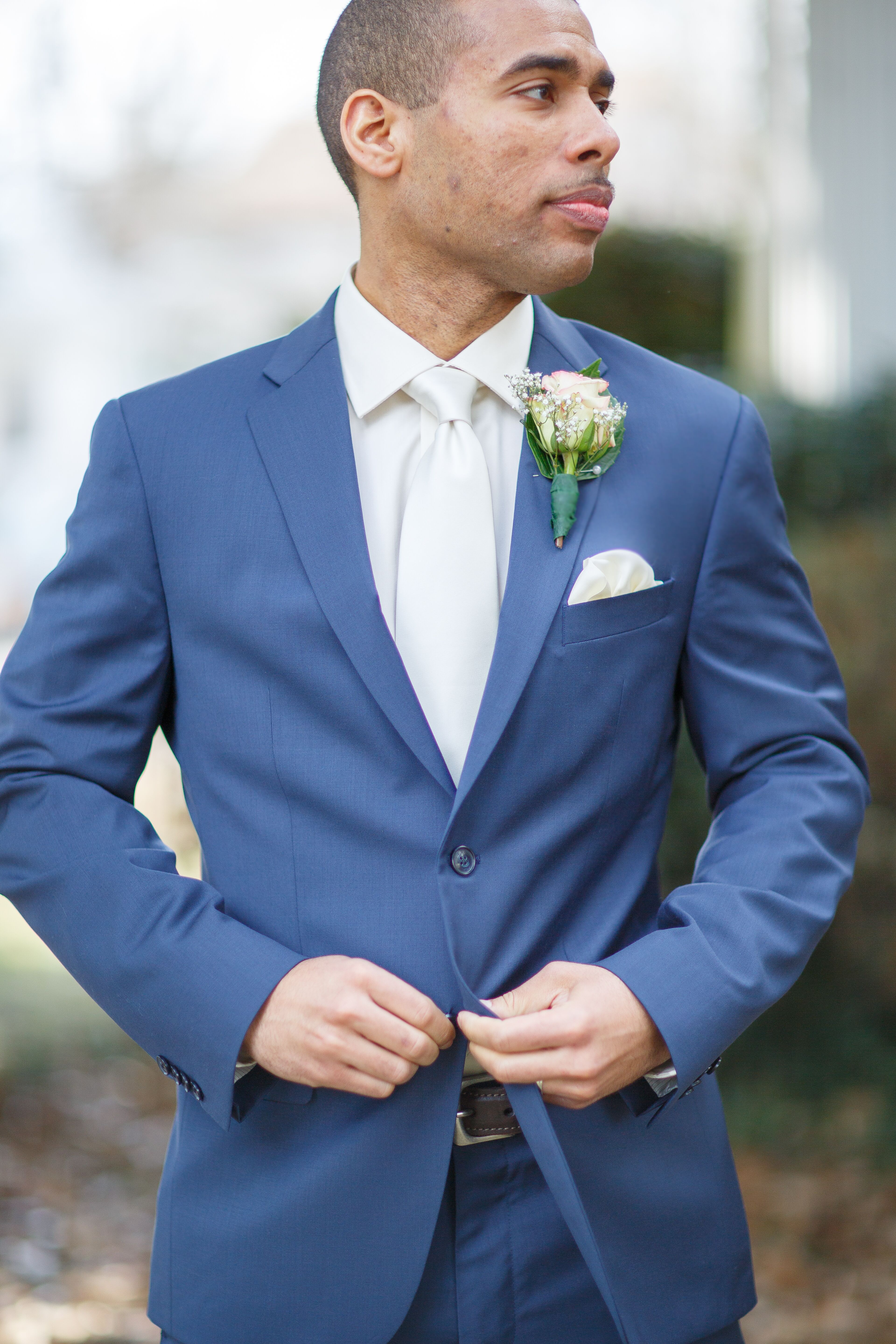 white tie white shirt blue suit
