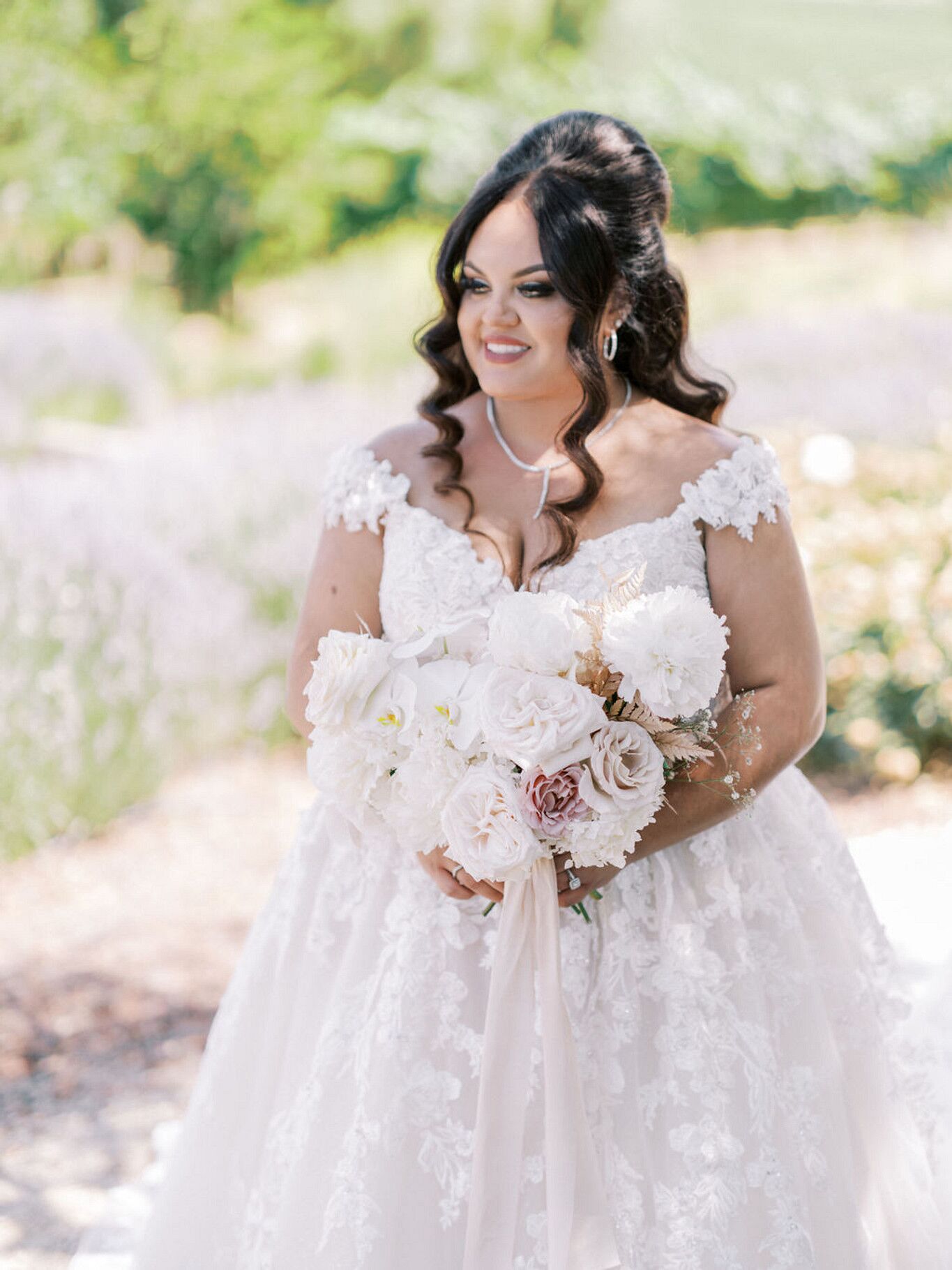 Bride With Half-Up Wedding Hairstyle and Off-the-Shoulder Wedding Dress