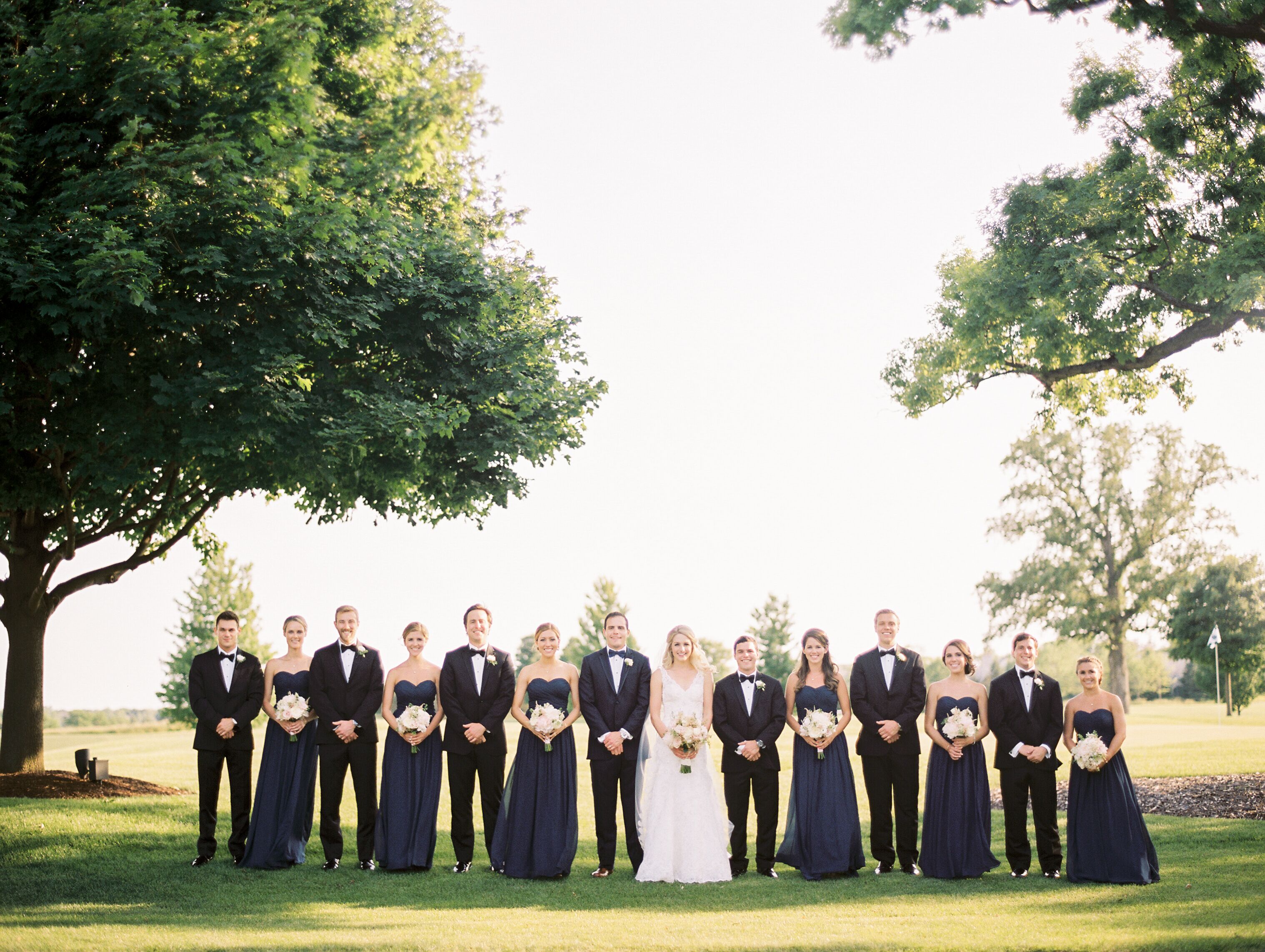 Strapless Navy Bridesmaid Dresses and Black Tuxedos