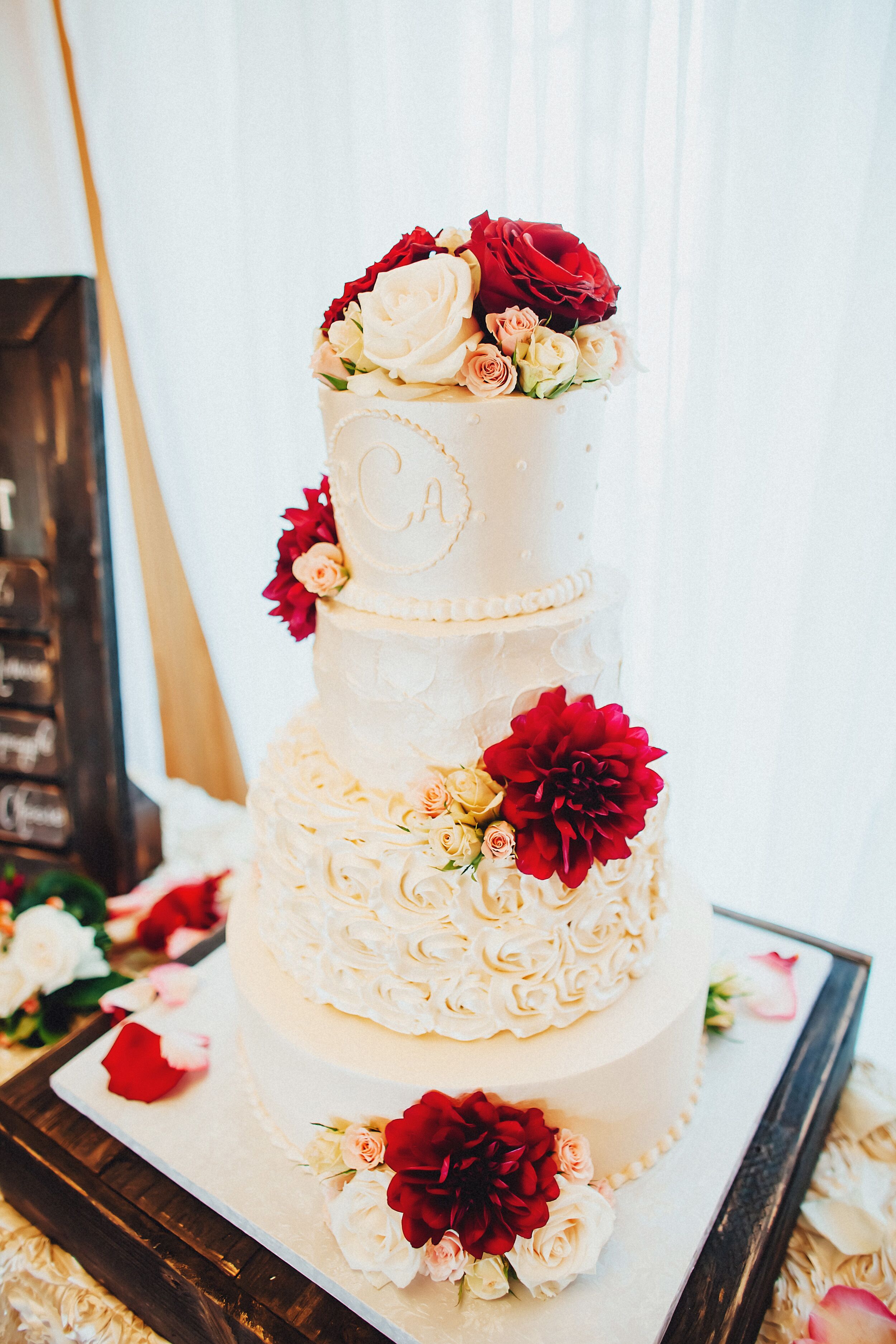 Ivory Buttercream Wedding Cake With Burgundy Flowers