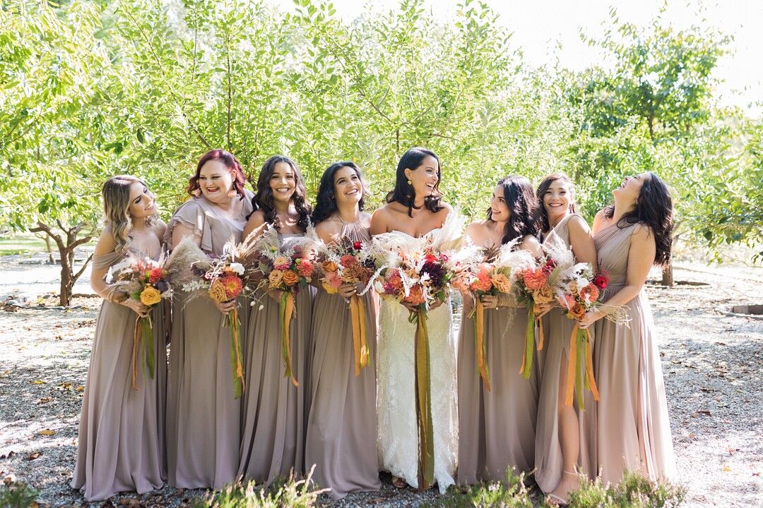 Bohemian Bridesmaids with Dusty-Pink Dresses and Bouquets