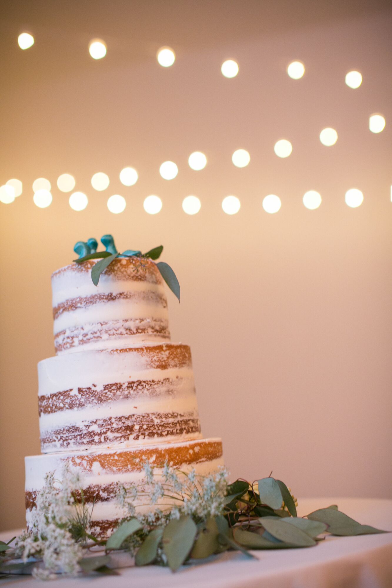 Three Tier Naked Cake With Eucalyptus