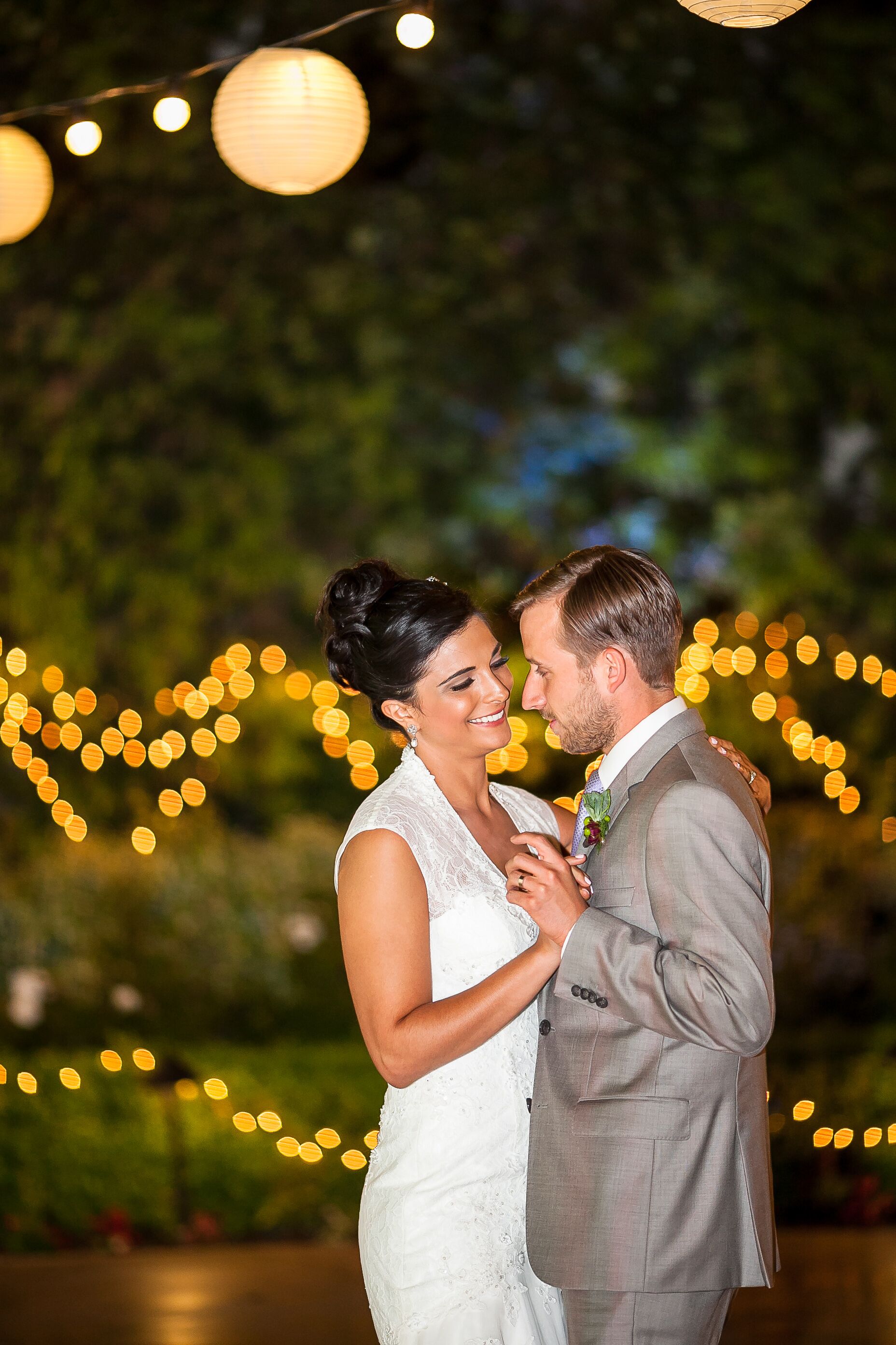 First Dance with Yellow Twinkle Lights in the Background