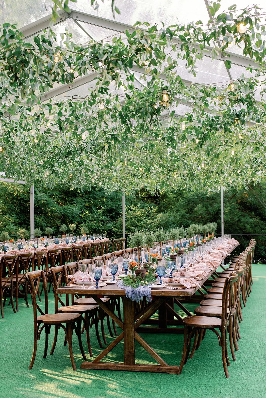 Hanging Greenery and Farm Table for Rehearsal Dinner Decor