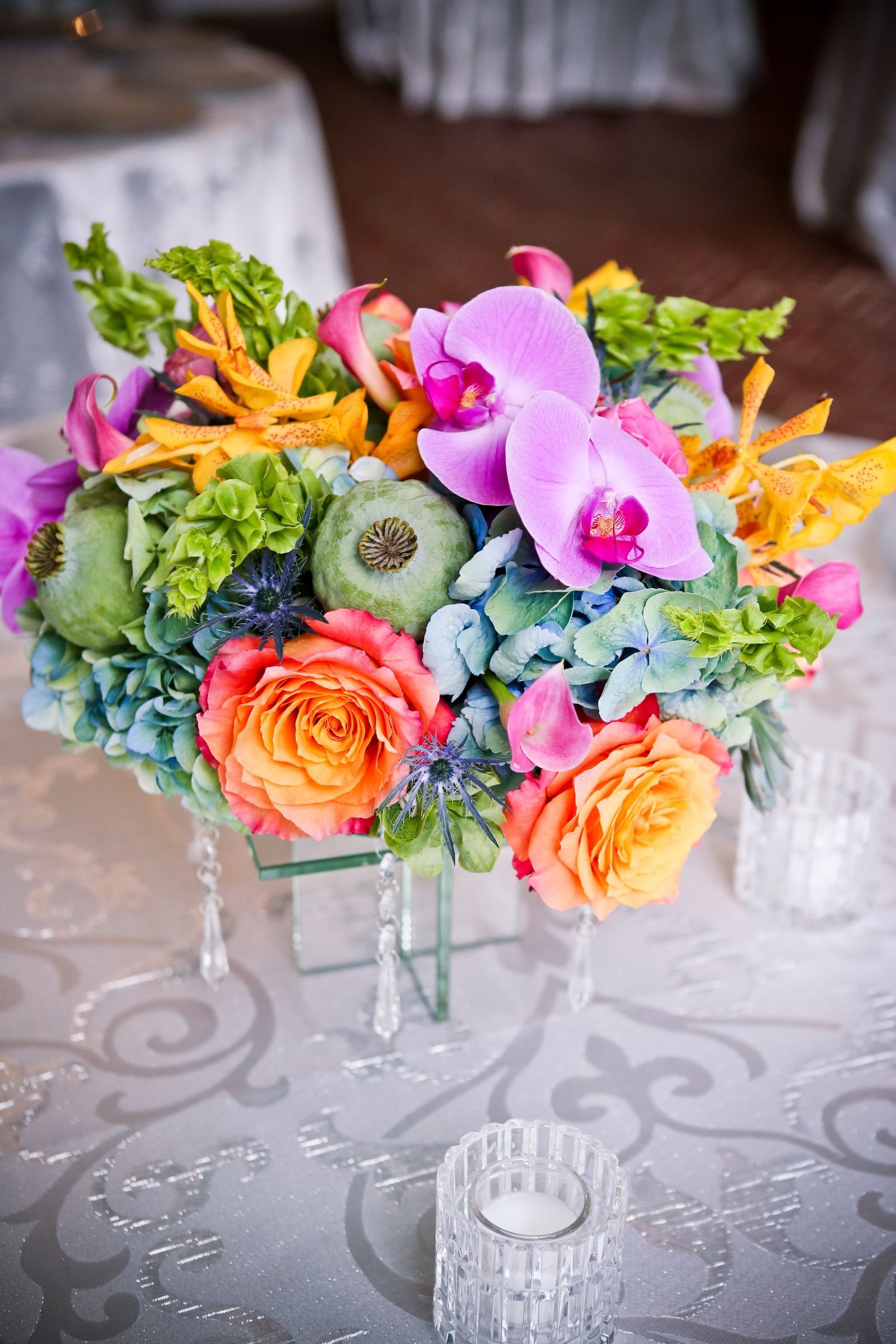 Low Poppy Pod and Phalaenopsis Orchid Centerpiece