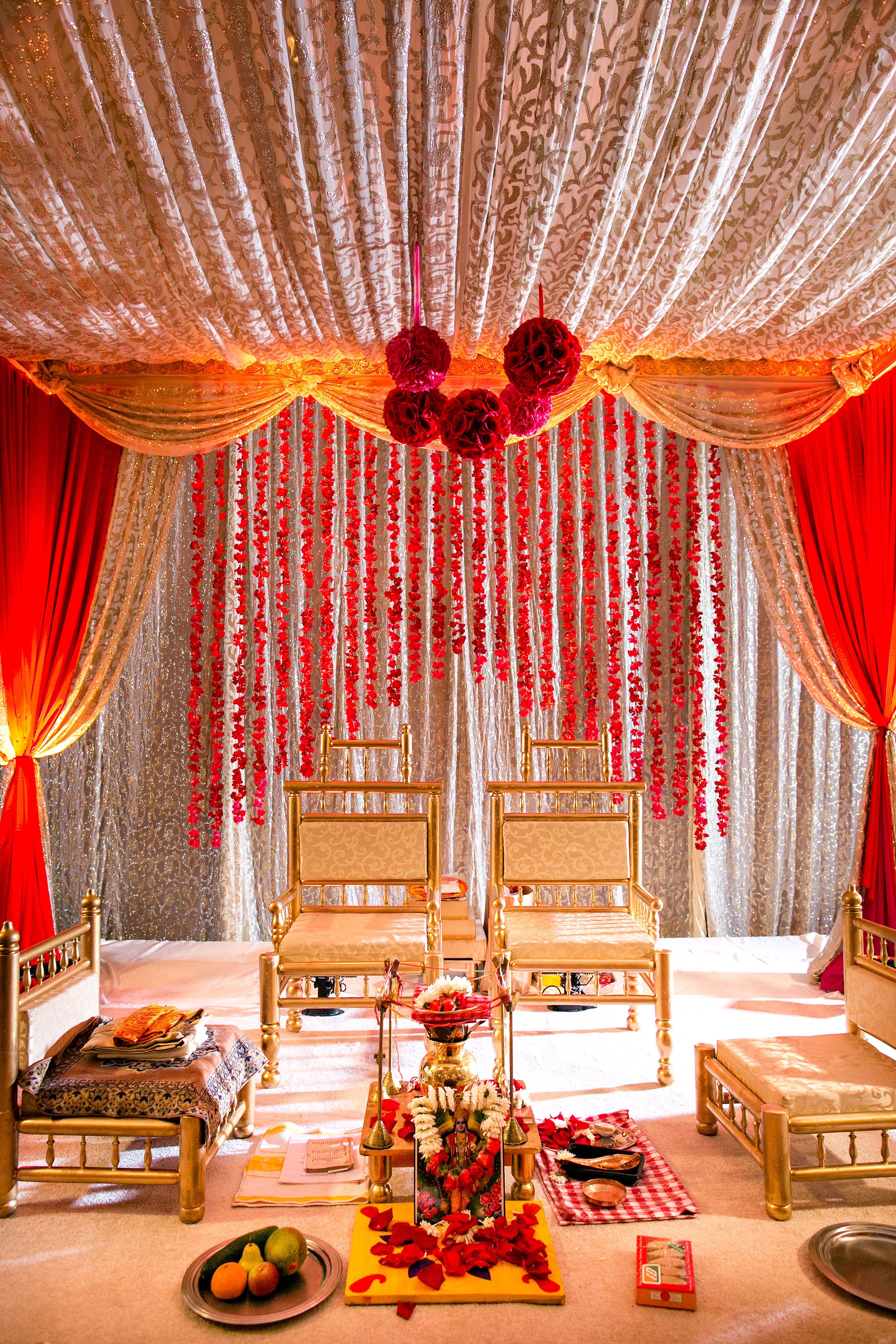 An Ornate Red and Gold Traditional Indian Mandap