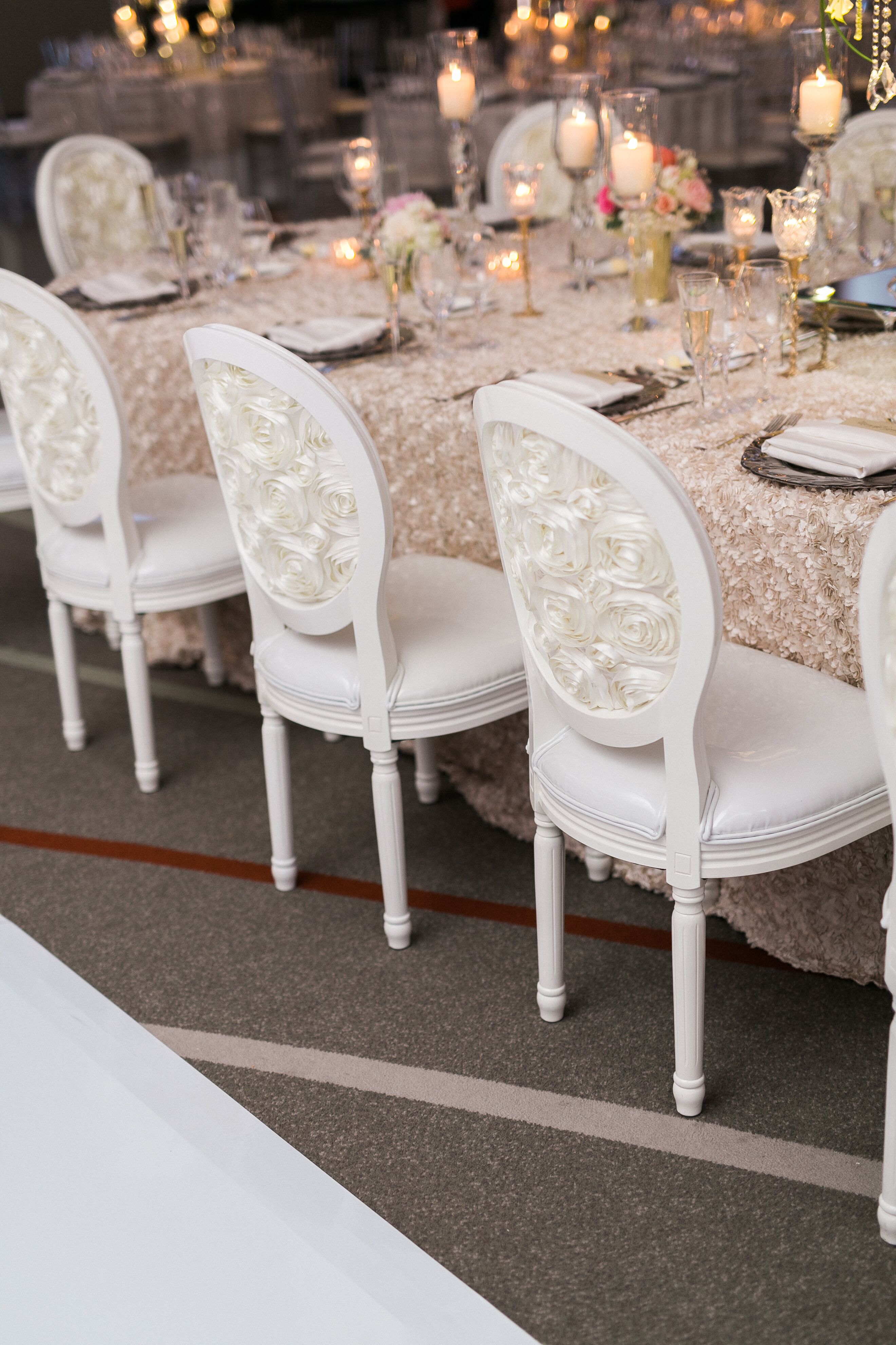 Elegant Ivory Rosette Backed Chairs
