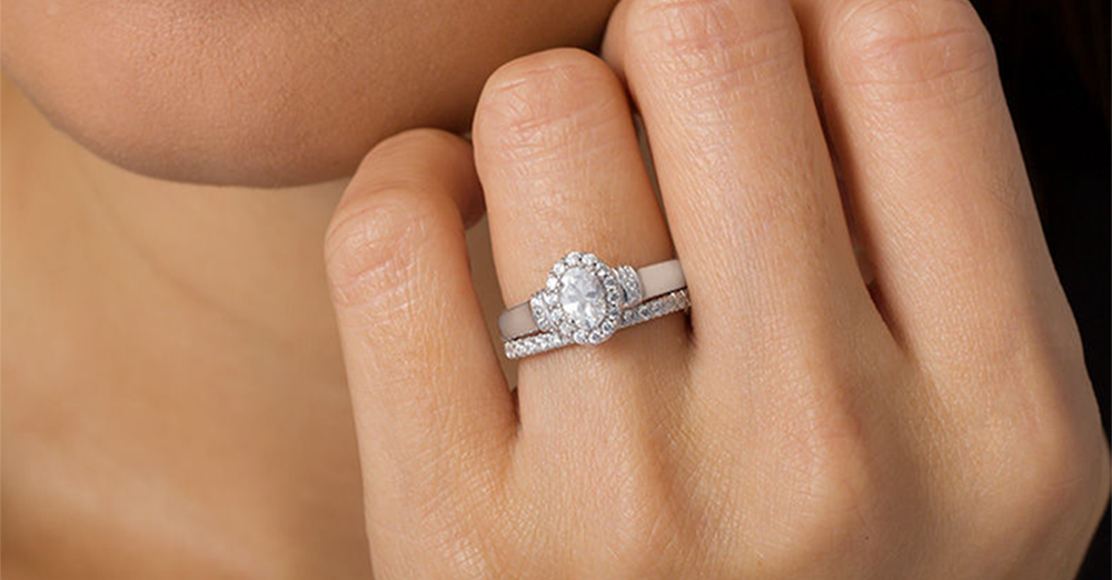 solitaire ring with two wedding bands