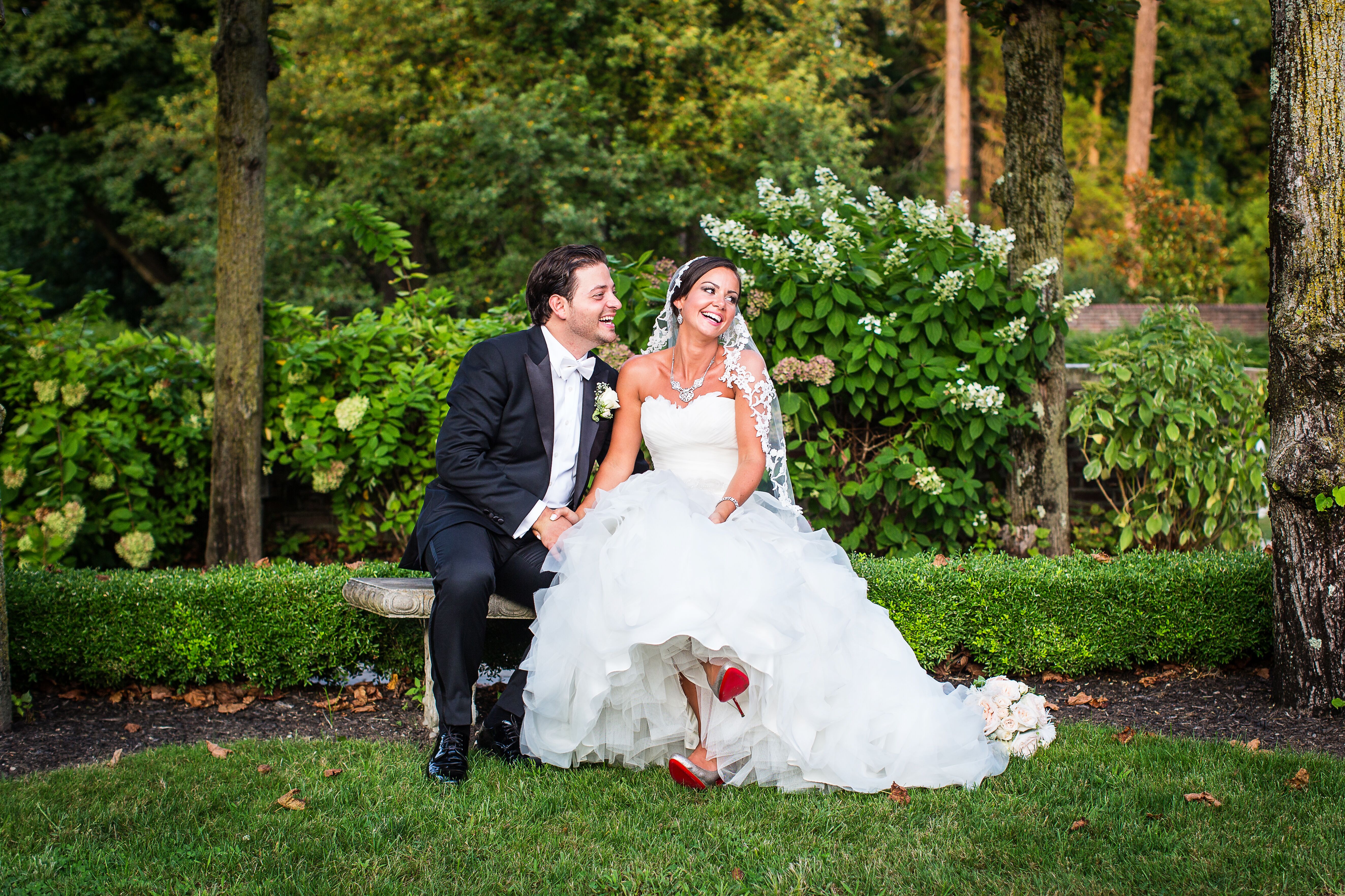 Groom and Bride in Strapless Ball Gown with Veil and Louboutin Heels