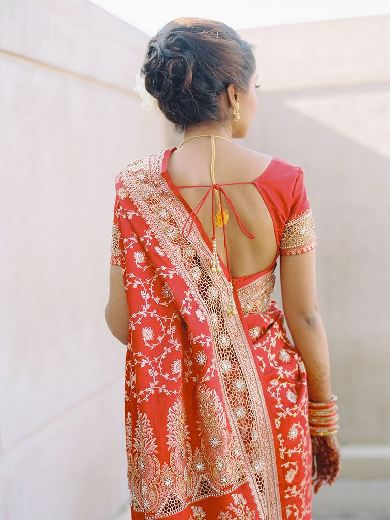 Bride in red and gold wedding sari
