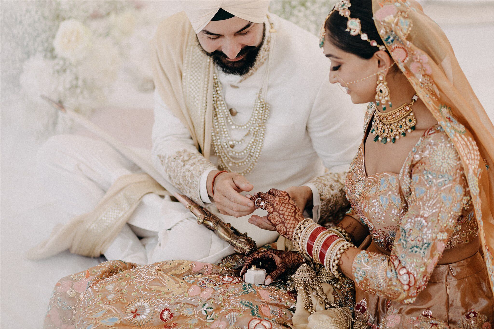 Sikh Bride and Groom Admiring Rings, Henna, Traditional Wedding Attire ...