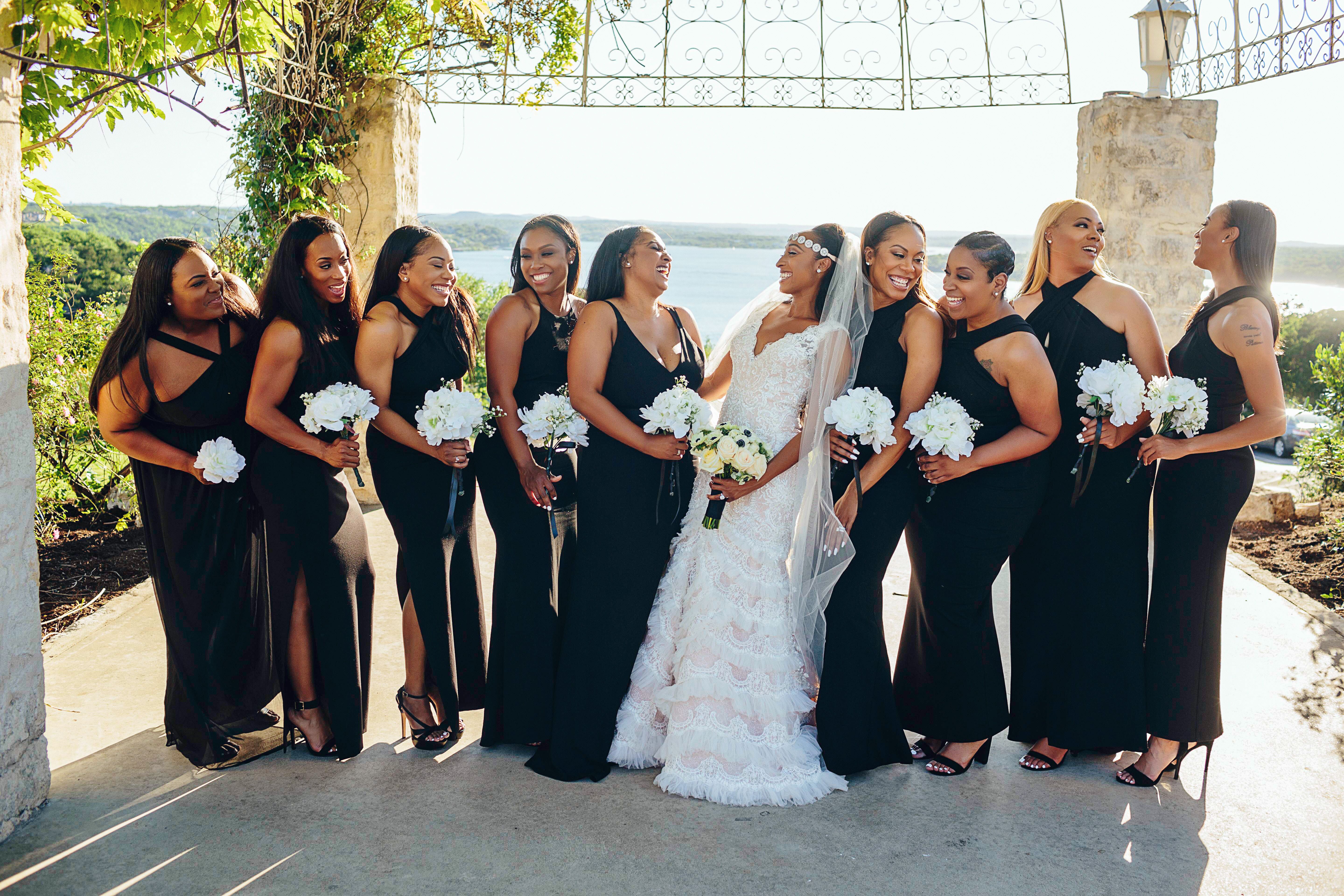 black wedding dress and bridesmaids