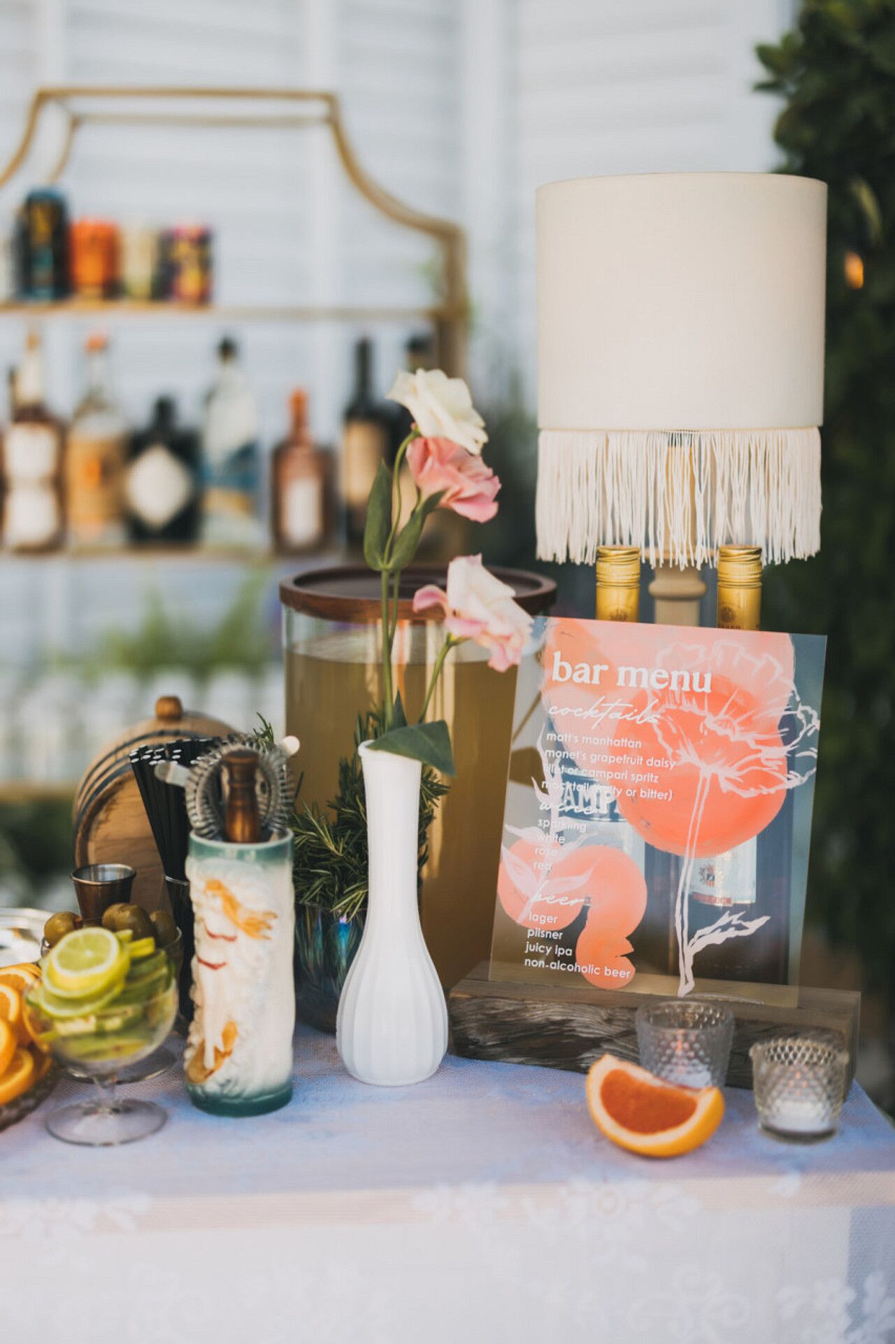 Custom Cocktail Menu in Pink With Macrame Lamp and Citrus Slices