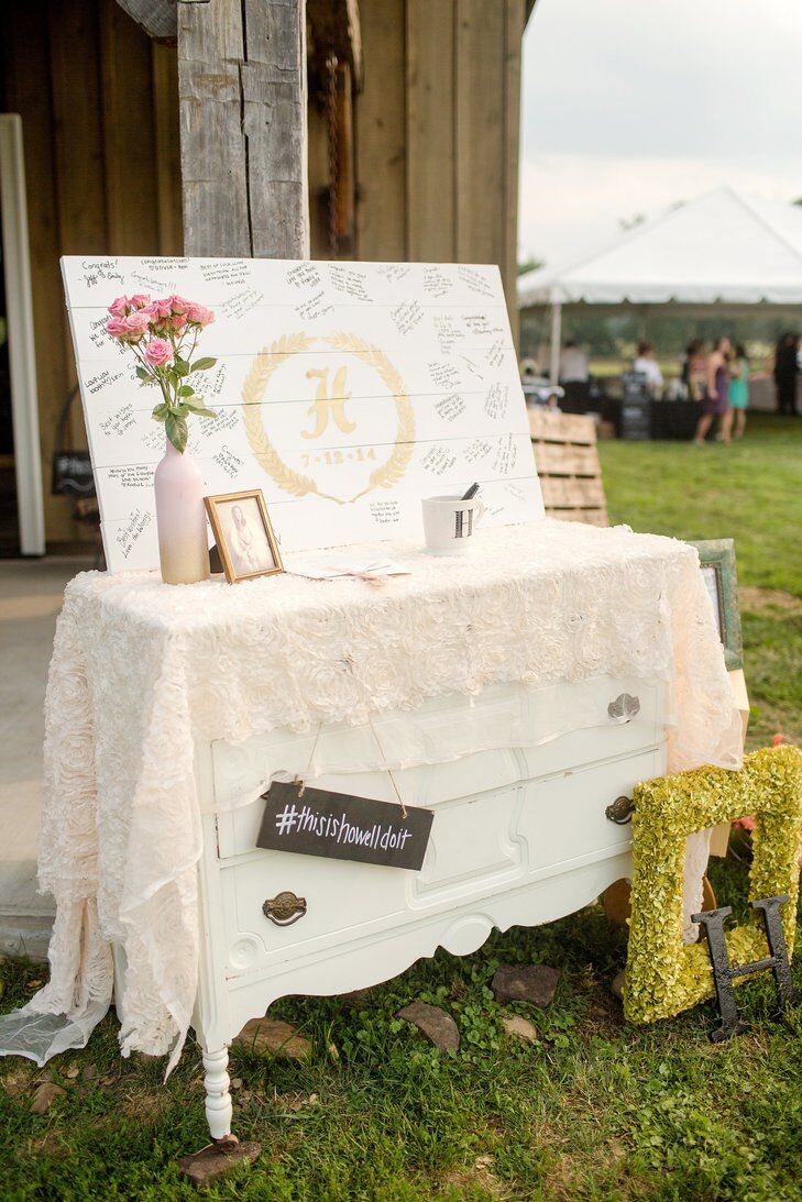 Guest book station with hanging hashtag sign 