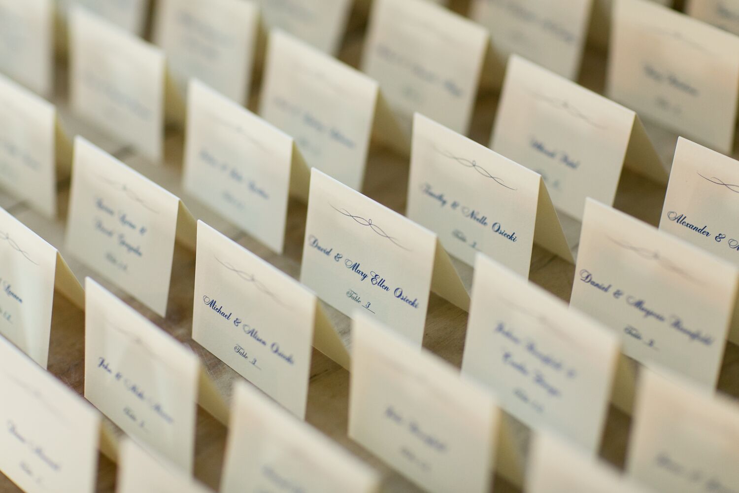 Classic Ivory Folded Escort Cards With Navy Script