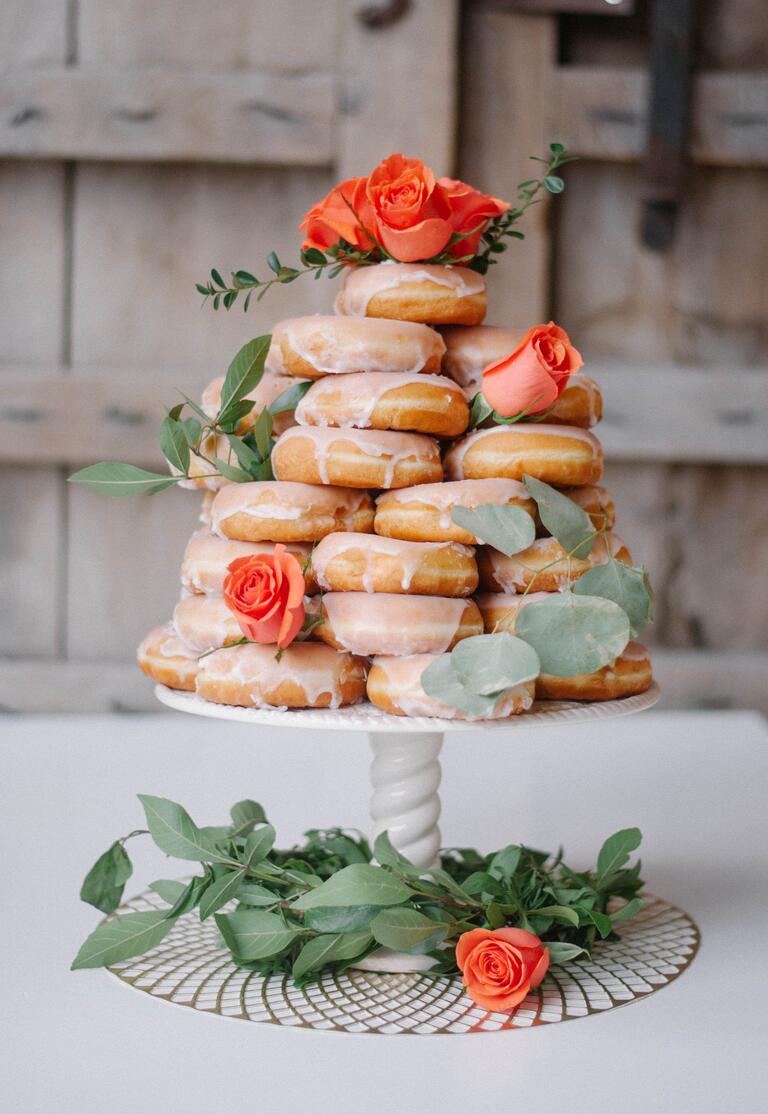 Romantic doughnuts cake with orange garden roses
