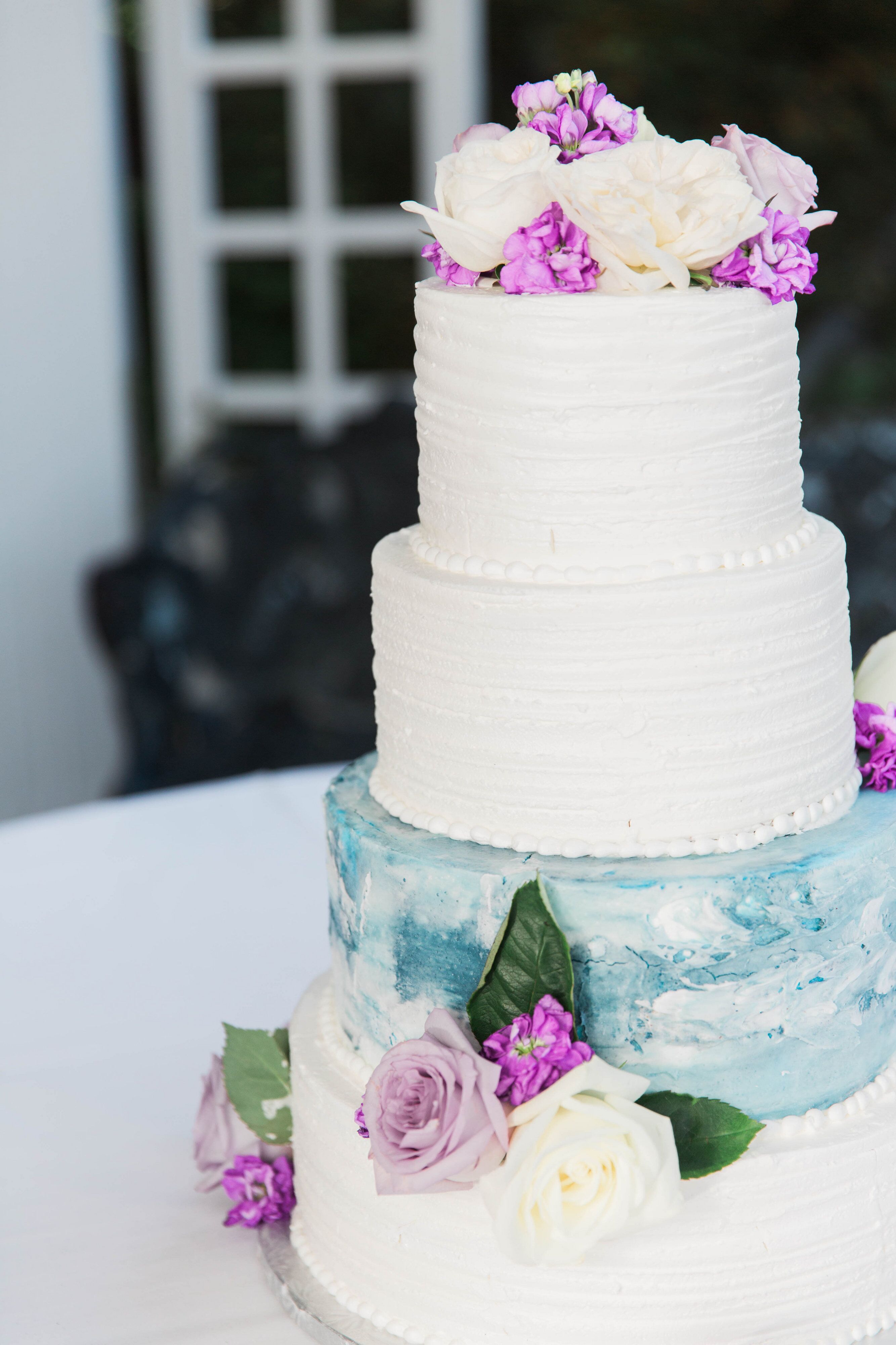 Blue Marble Wedding Cake With Flowers