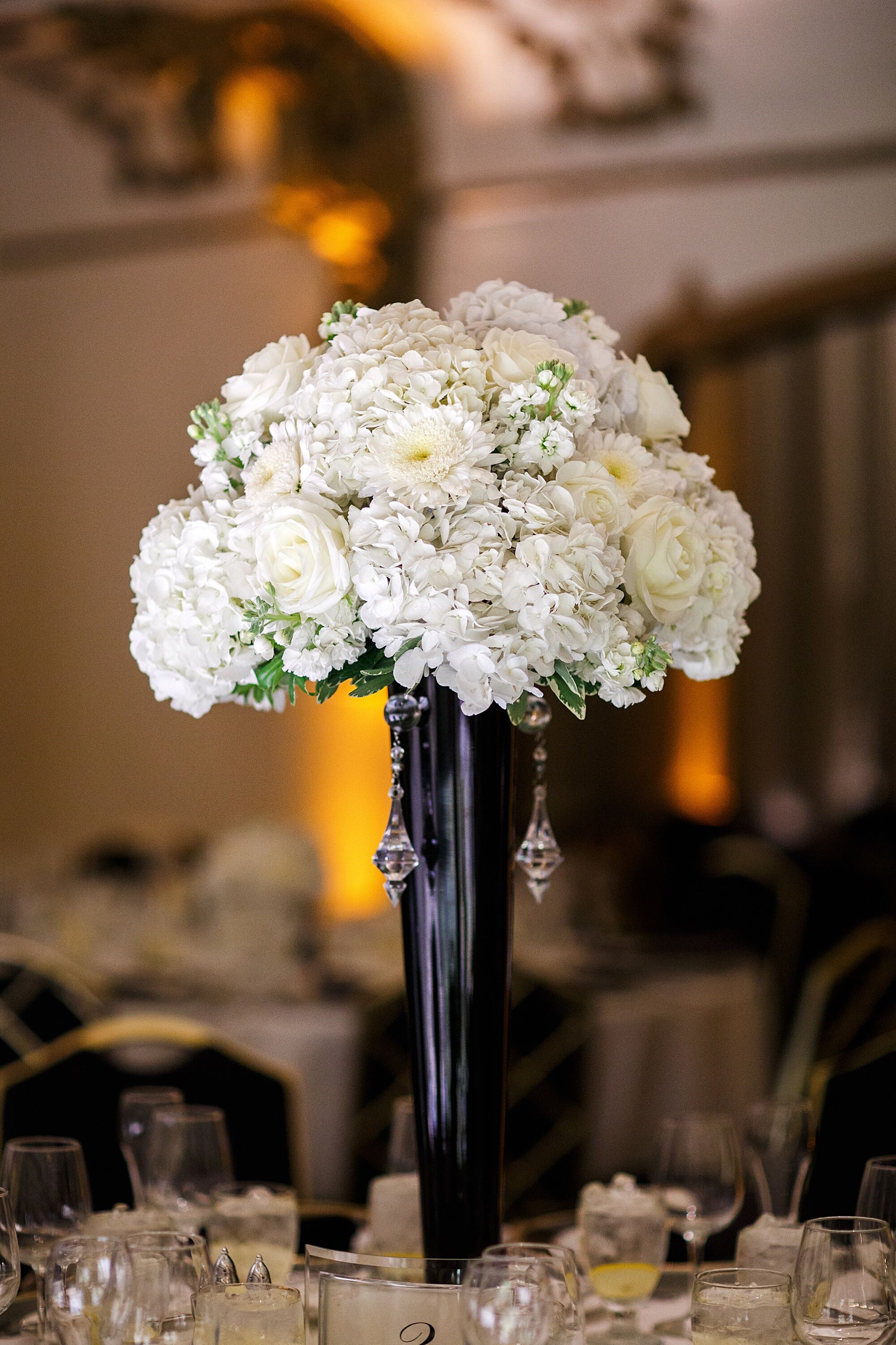 Black-and-White Centerpiece With Roses and Hydrangeas