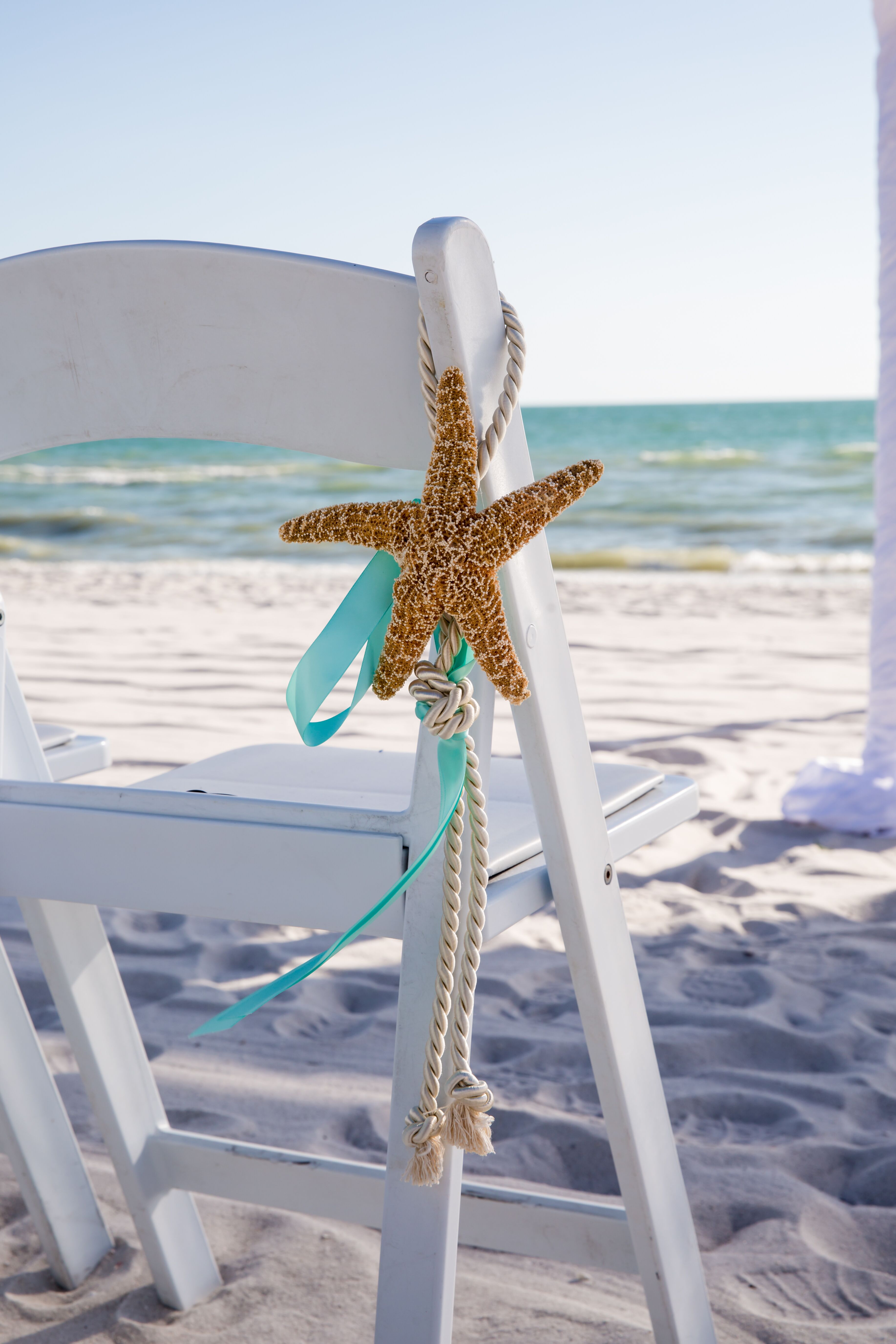 Starfish Aisle Decor With Aqua Ribbon