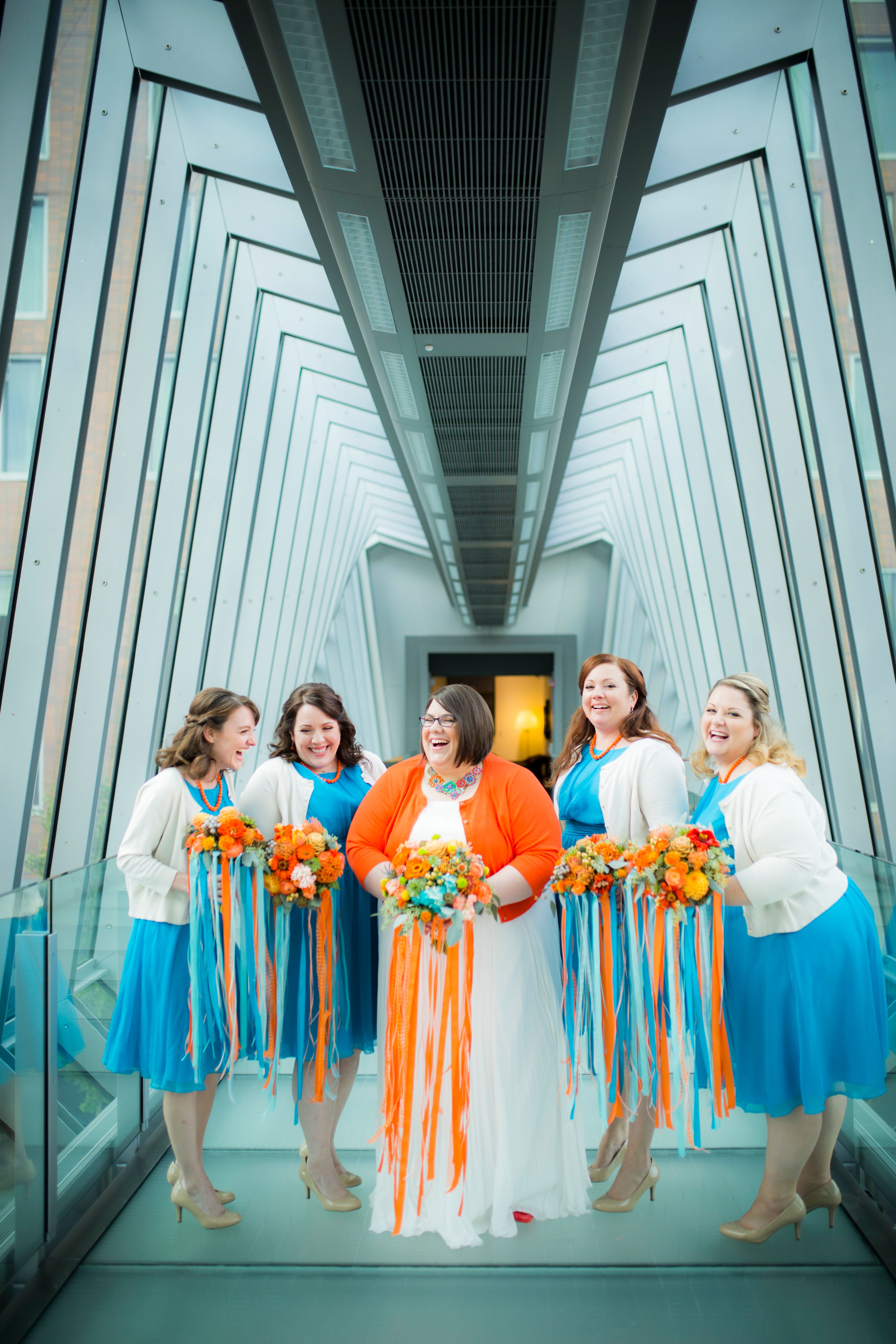 Orange and 2024 blue bridesmaid dresses