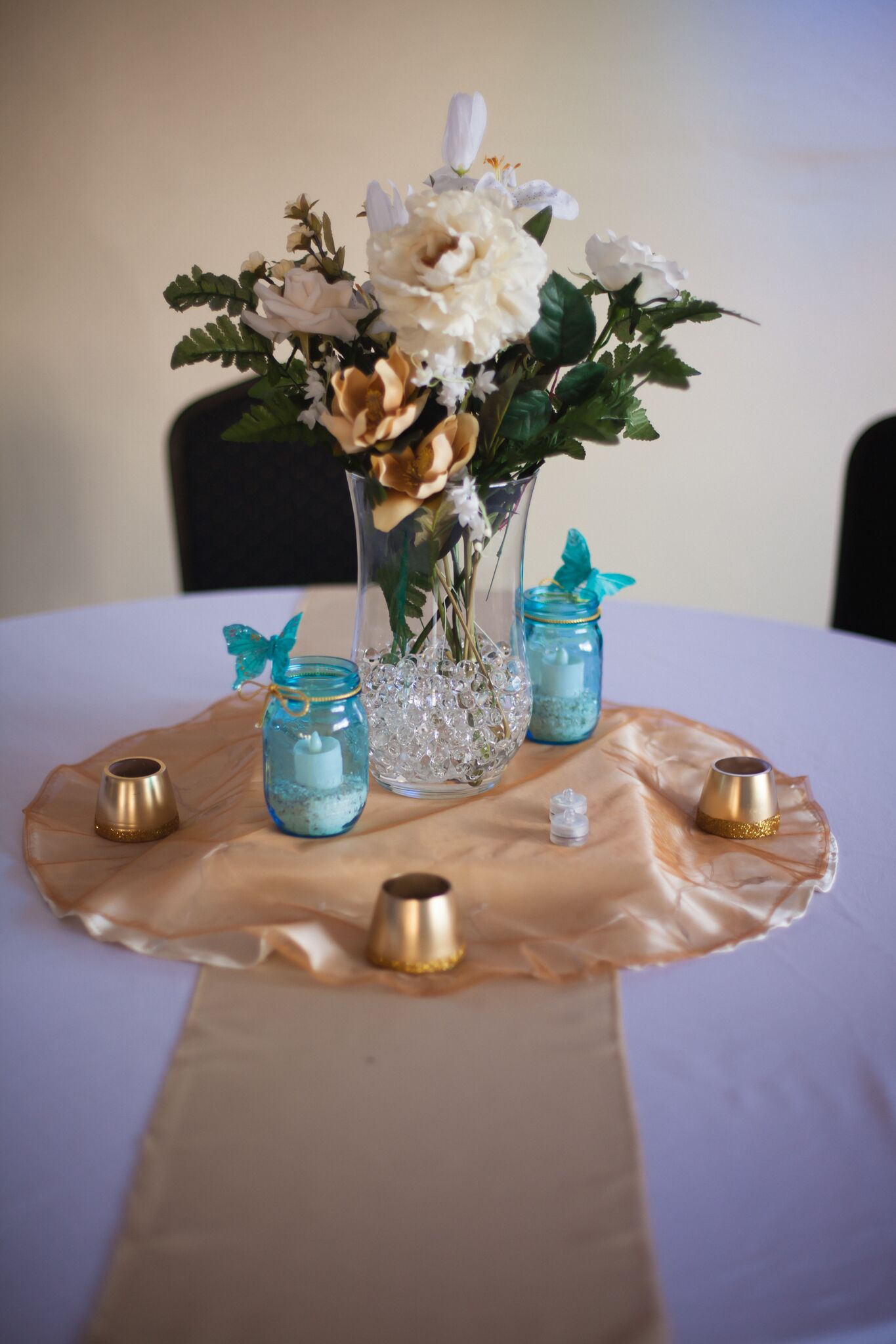 Champagne Table Runners with Turquoise Jars and Votives for New Mexican ...