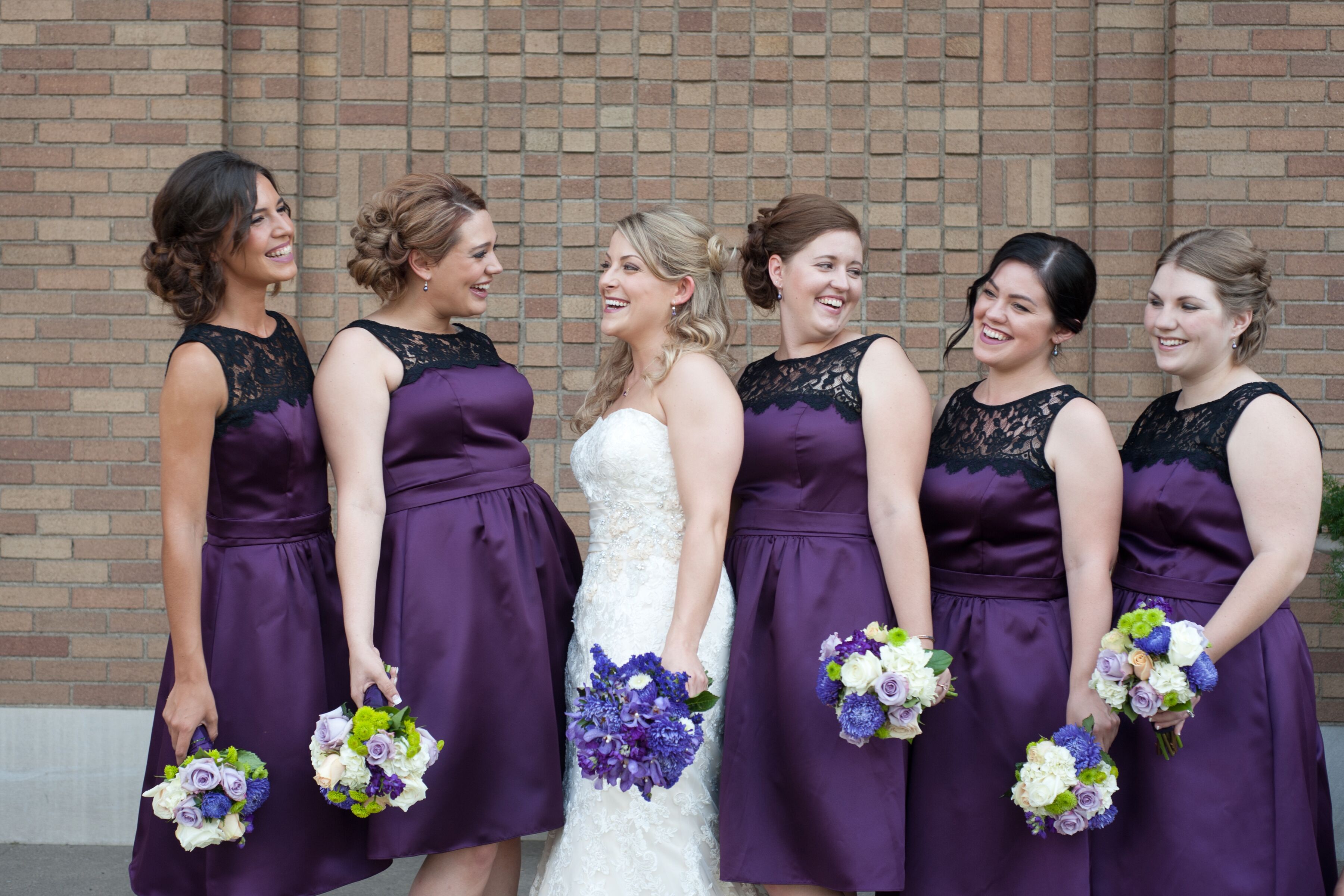 Purple, Knee-Length Bridesmaid Dresses with Black Lace Detail