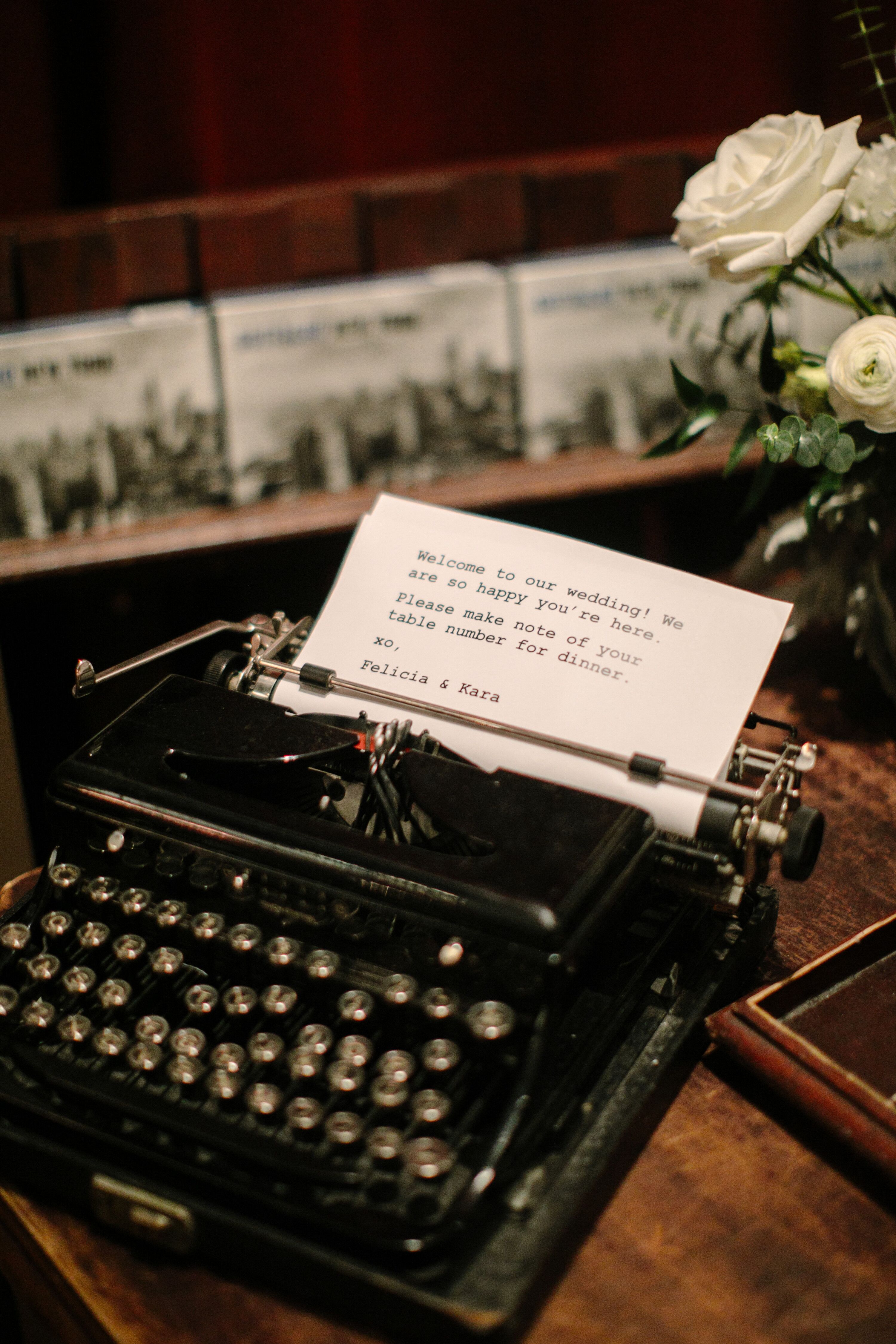 Welcome Sign on Paper Inside Vintage Typewriter at Bookstore Reception