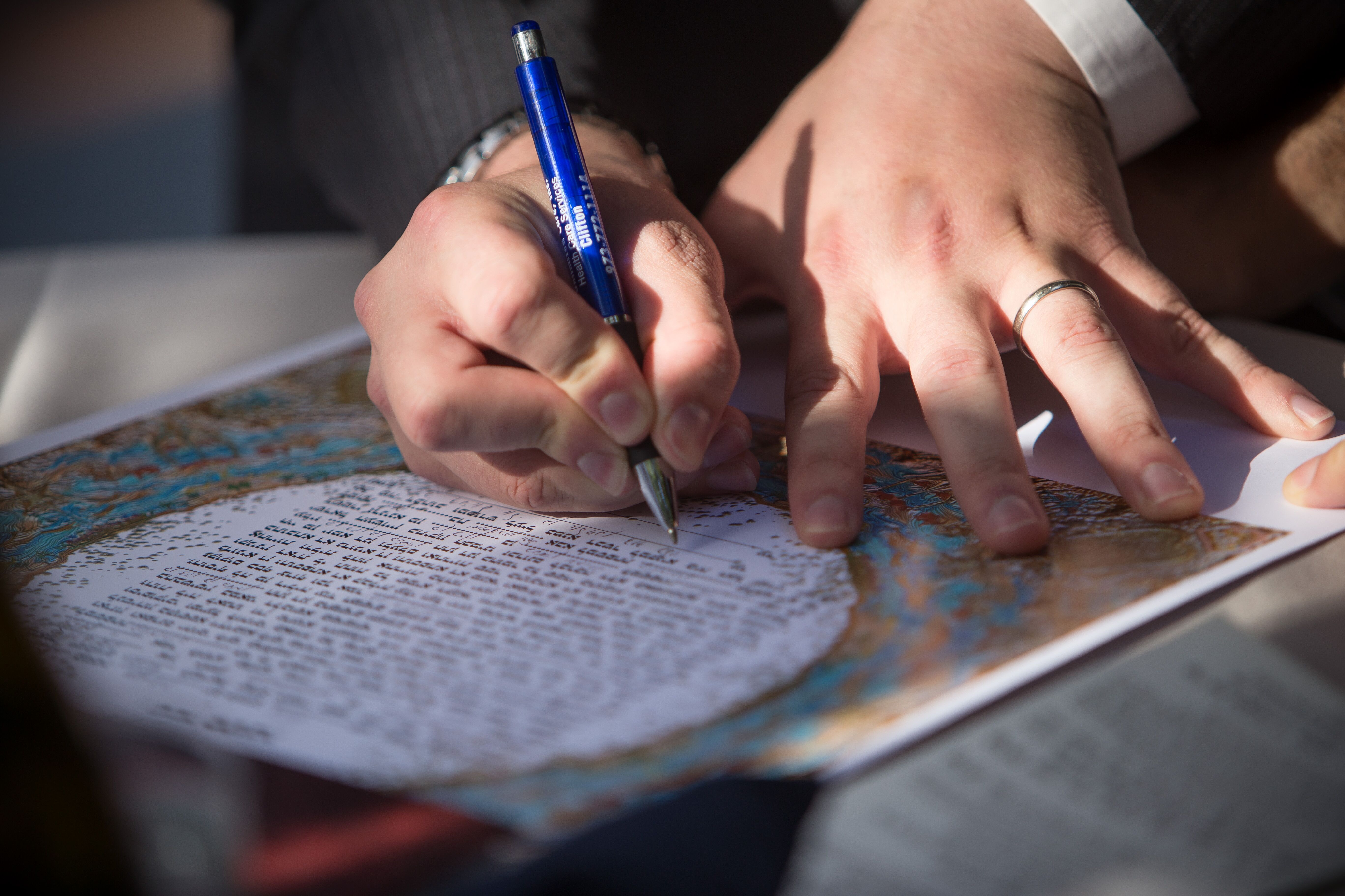 Traditional Jewish ketubah display during a wedding ceremony
